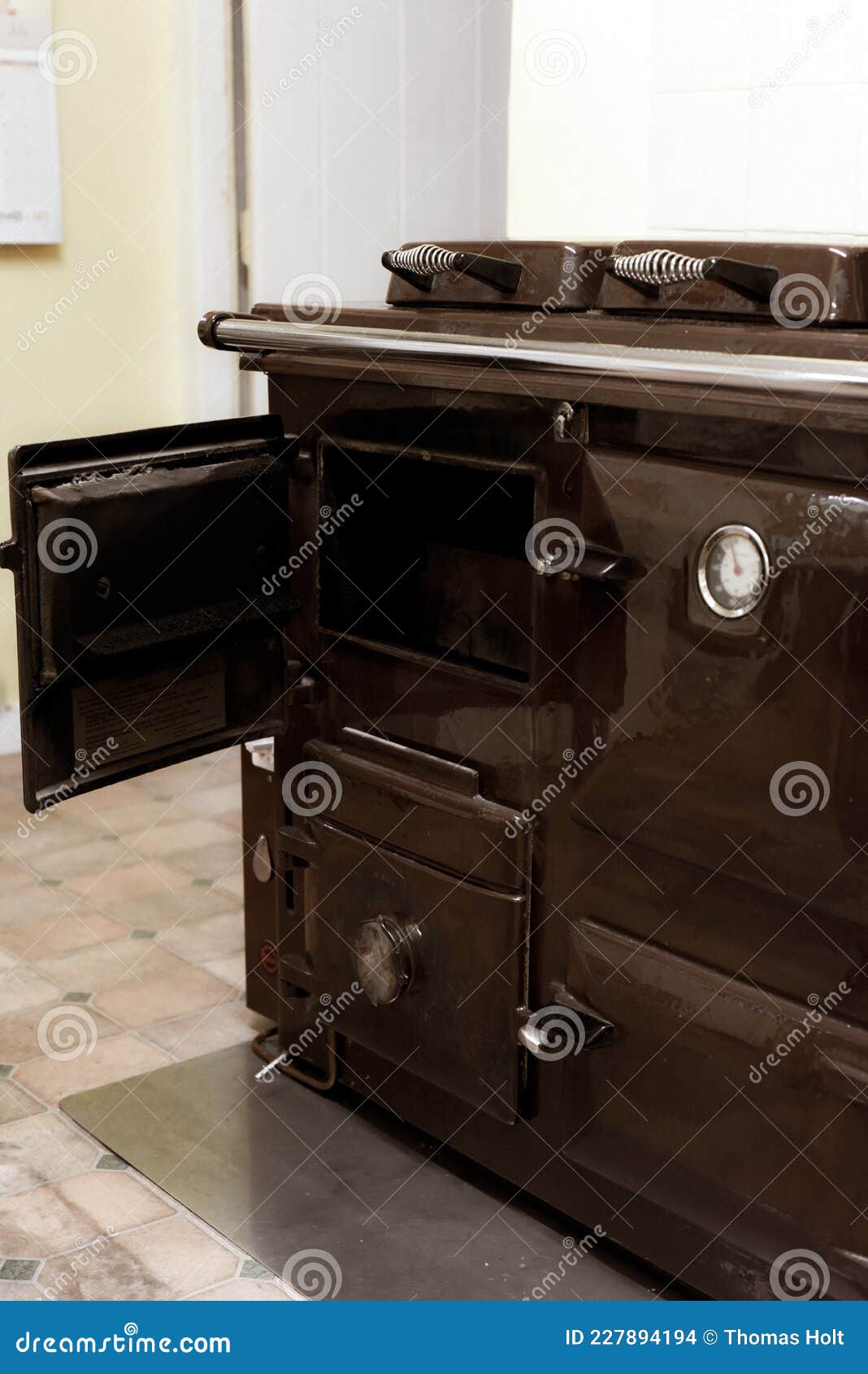 Old Style Oil Burning Stove in Retro Kitchen Interior Stock Photo