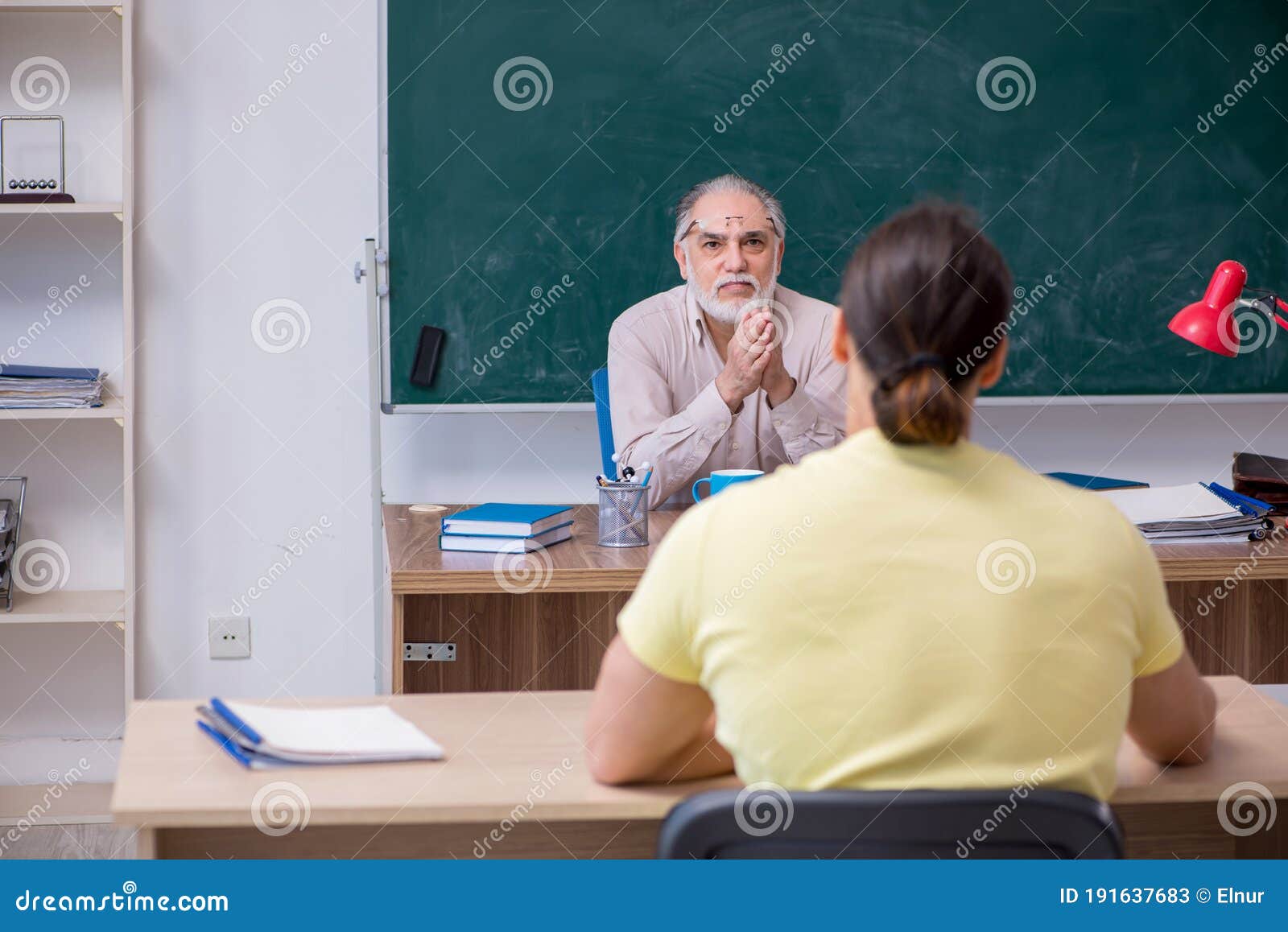 Old Teacher And Young Male Student In The Classroom Stock Image Image