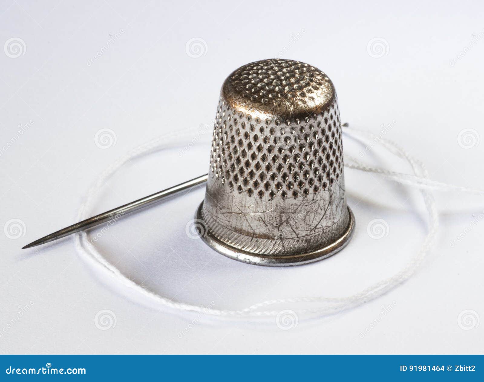 Old Thimble and a Needle stock photo. Image of thimble 91981464