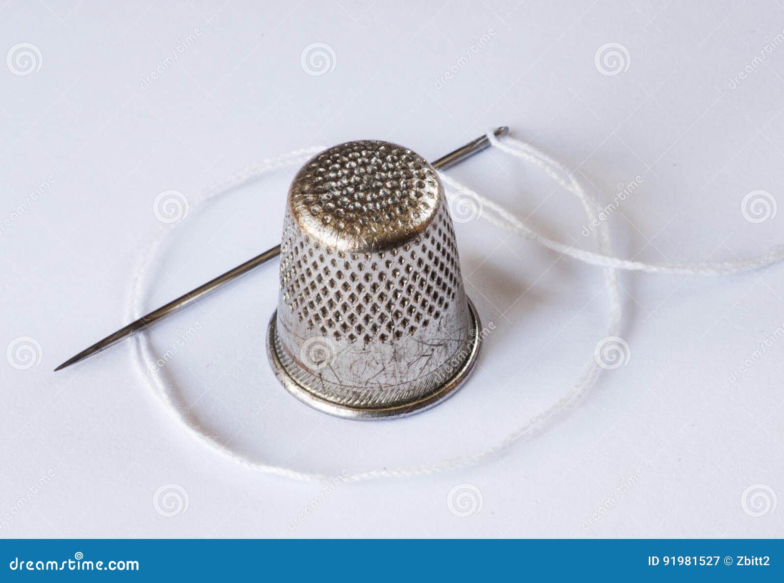 Old Thimble and a Needle stock image. Image of needle 91981527