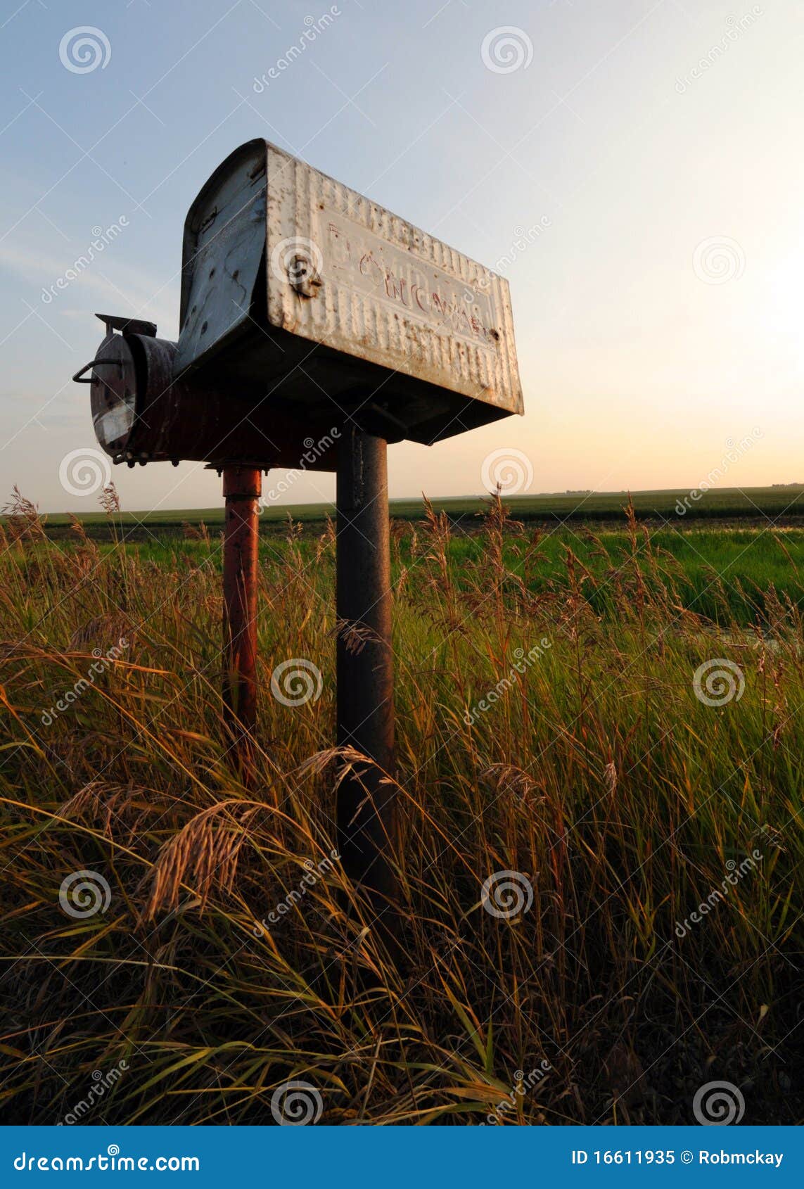 old tin roadside mailbox in the prairies