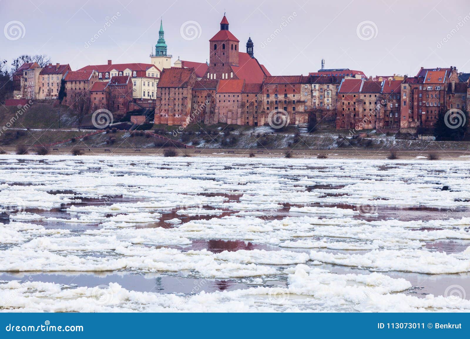 old town of grudziadz and frozen vistula river