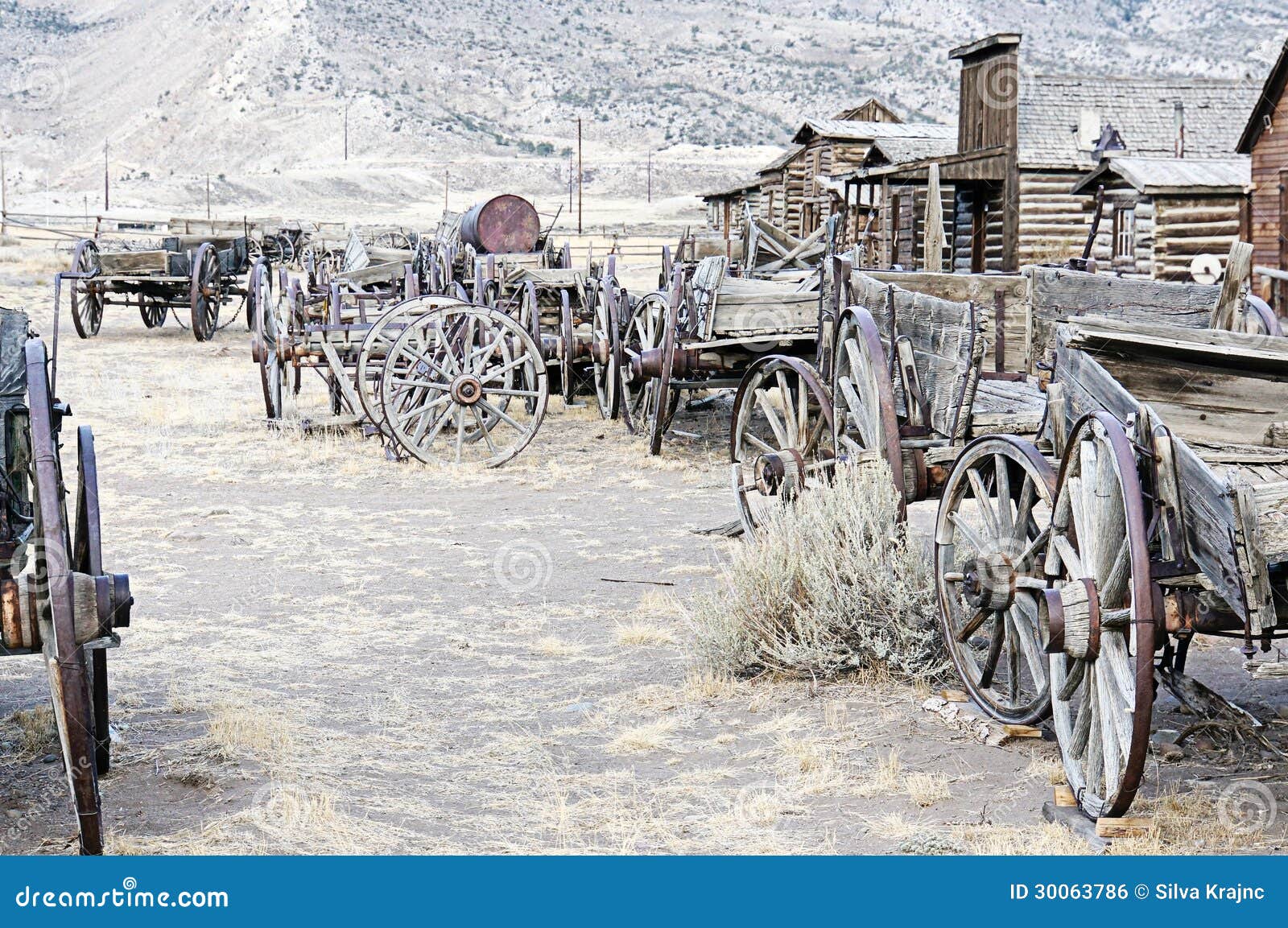 old wooden wagons in a ghost town cody, wyoming, united states