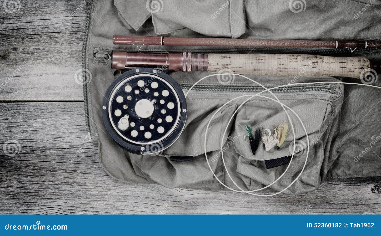 Old Trout Fishing Gear on Top of Fishing Vest Stock Photo - Image