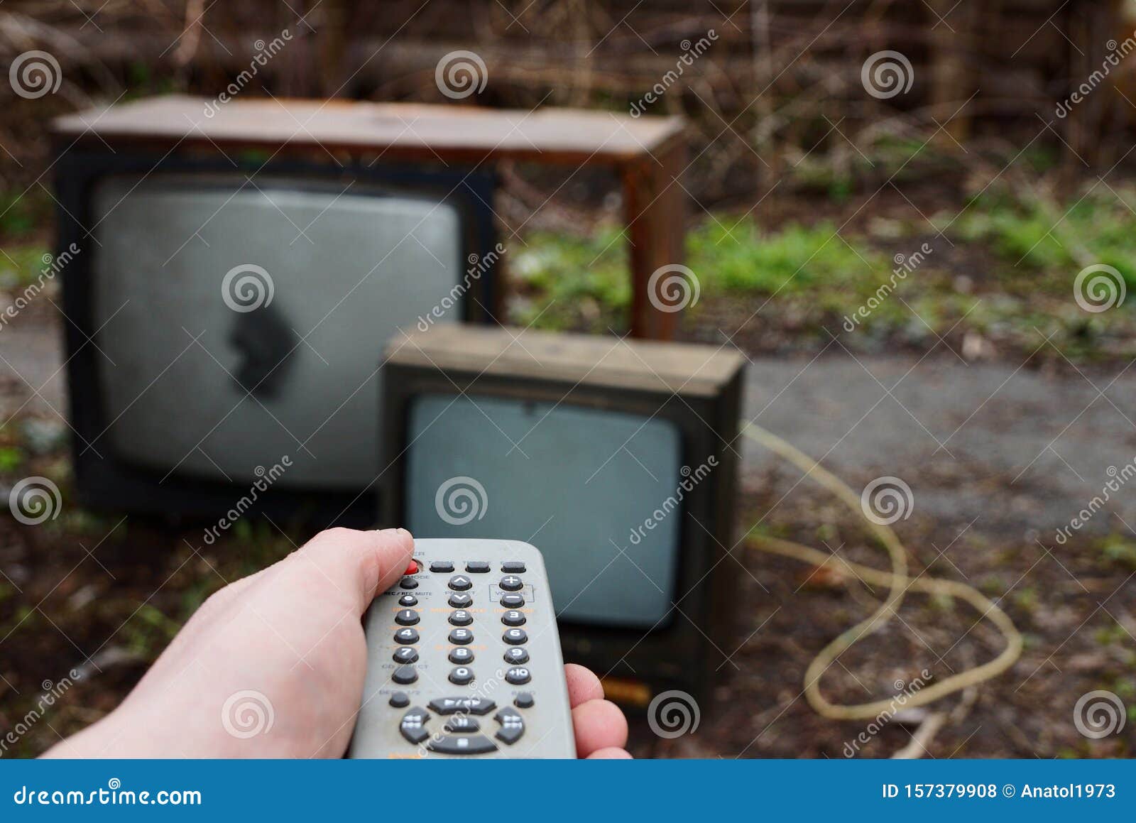 Old Tv and Remote Control in the Hand Stock Photo Image of garbage