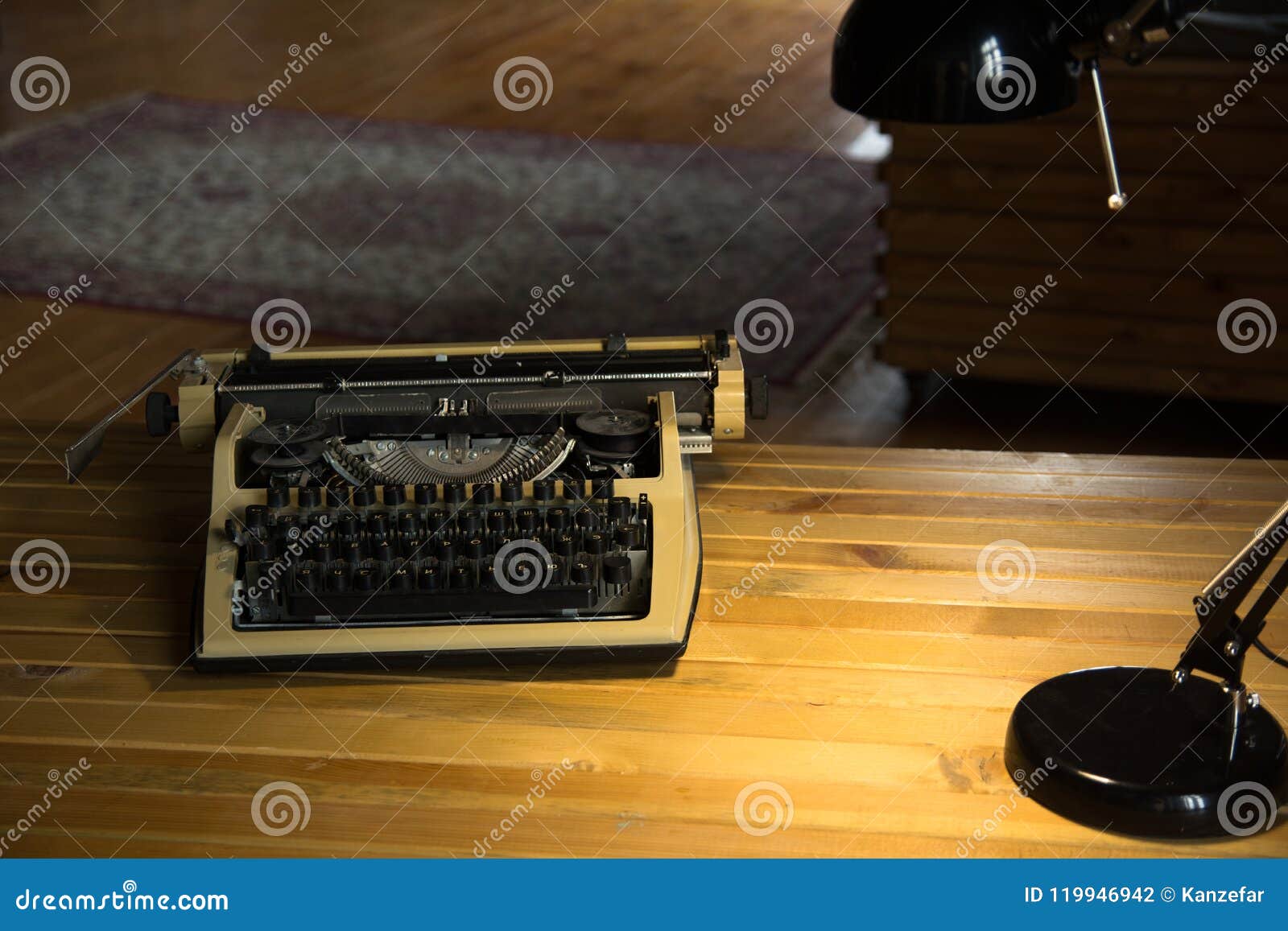 An Old Typewriter and a Lamp on a Wooden Lacquered Table and a Room
