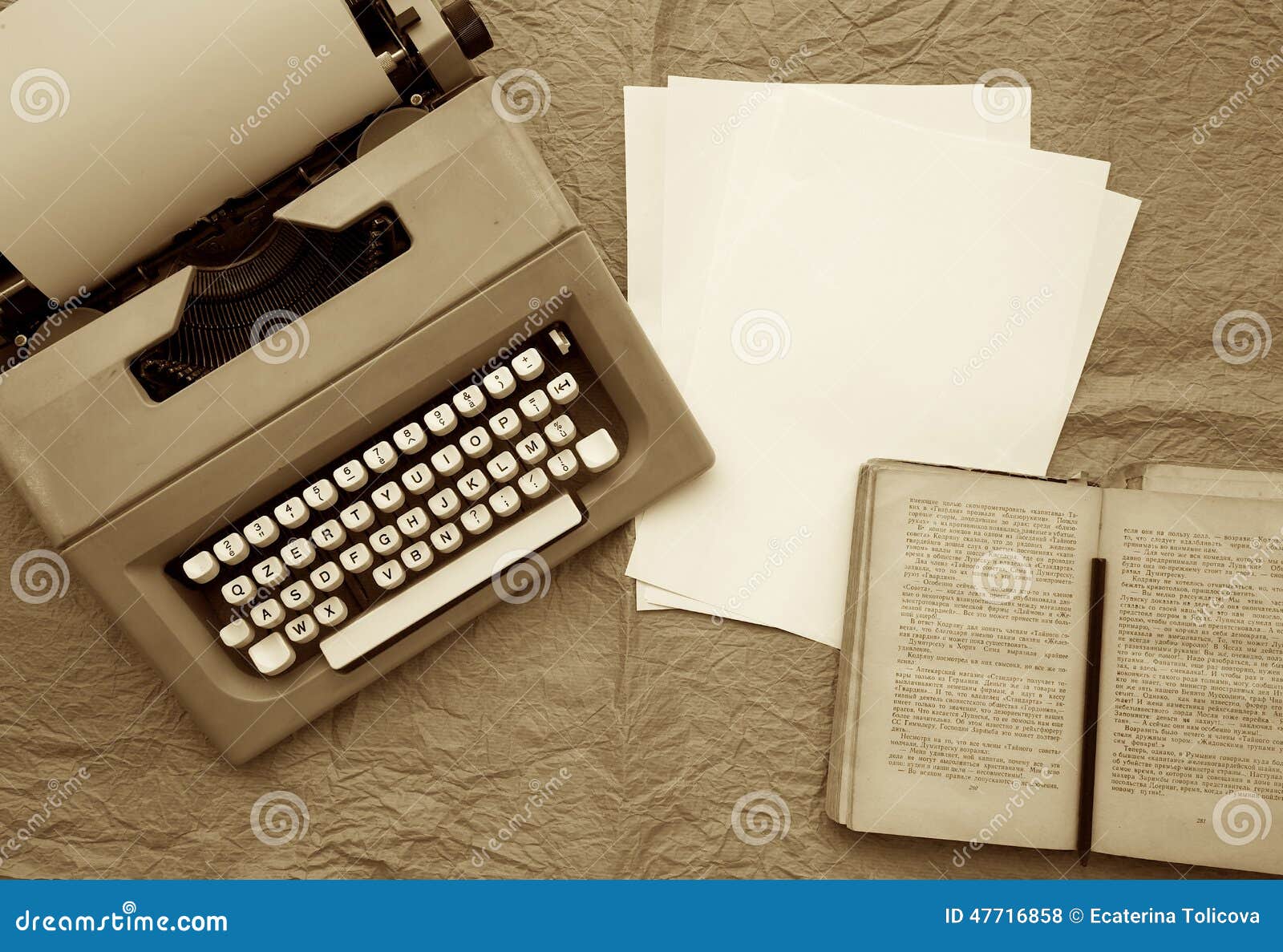 Old Typing Machine, White Sheets of Paper,old Book on an Old Paper