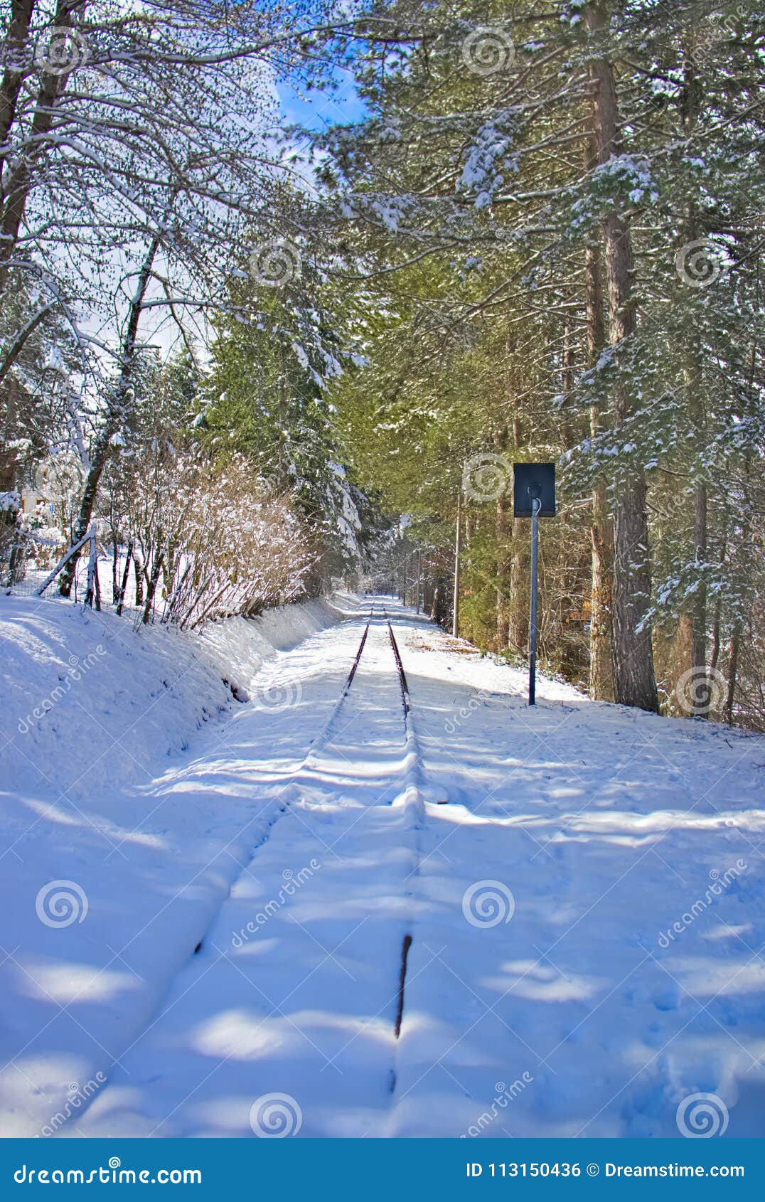 snow covered mountain railway in late winter