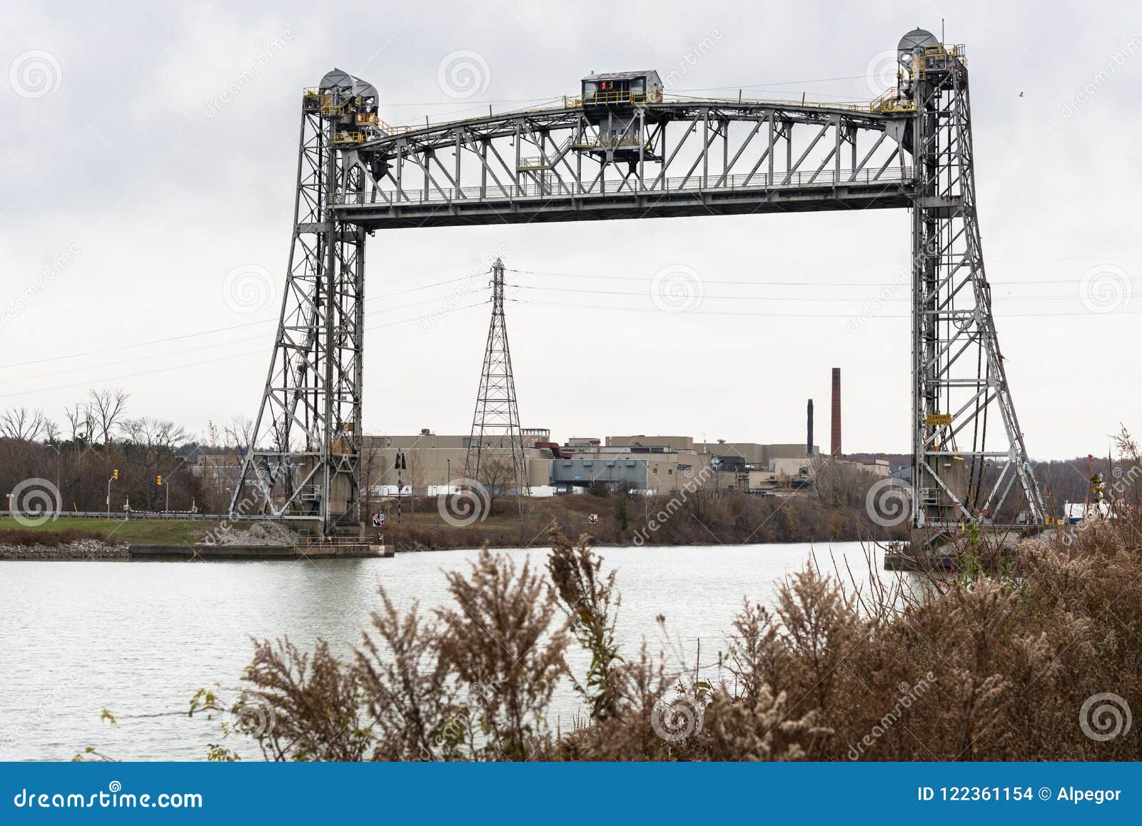 old vertical lift bridge across a ship canal in autumn