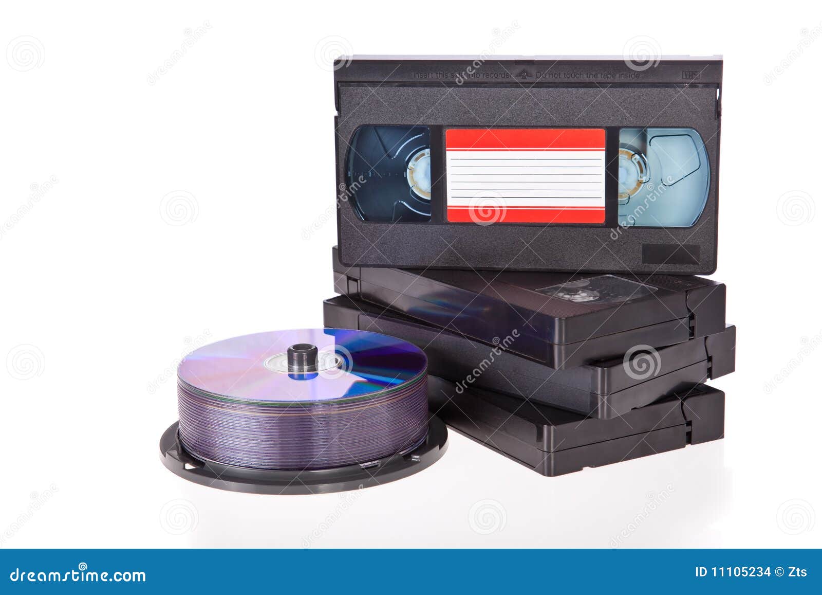 Old Video Cassette Tapes With DVD Discs Stock Photo 