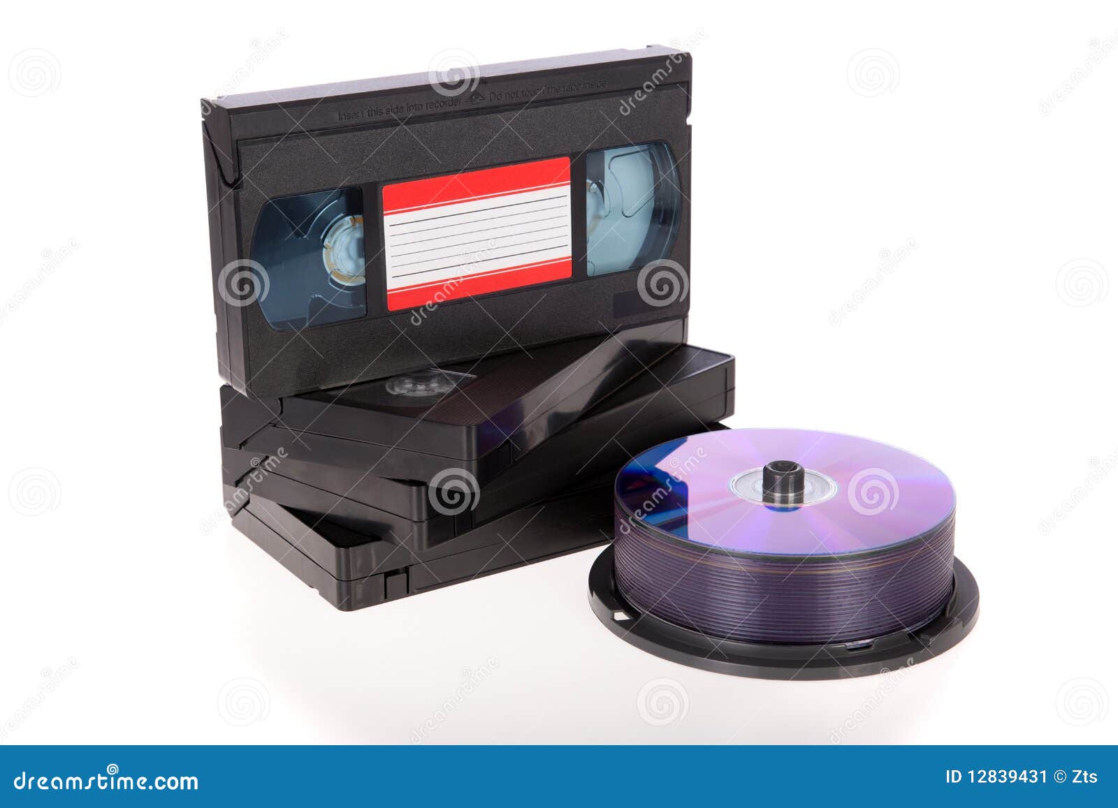 Old Video Cassette Tapes With DVD Discs Stock Image 
