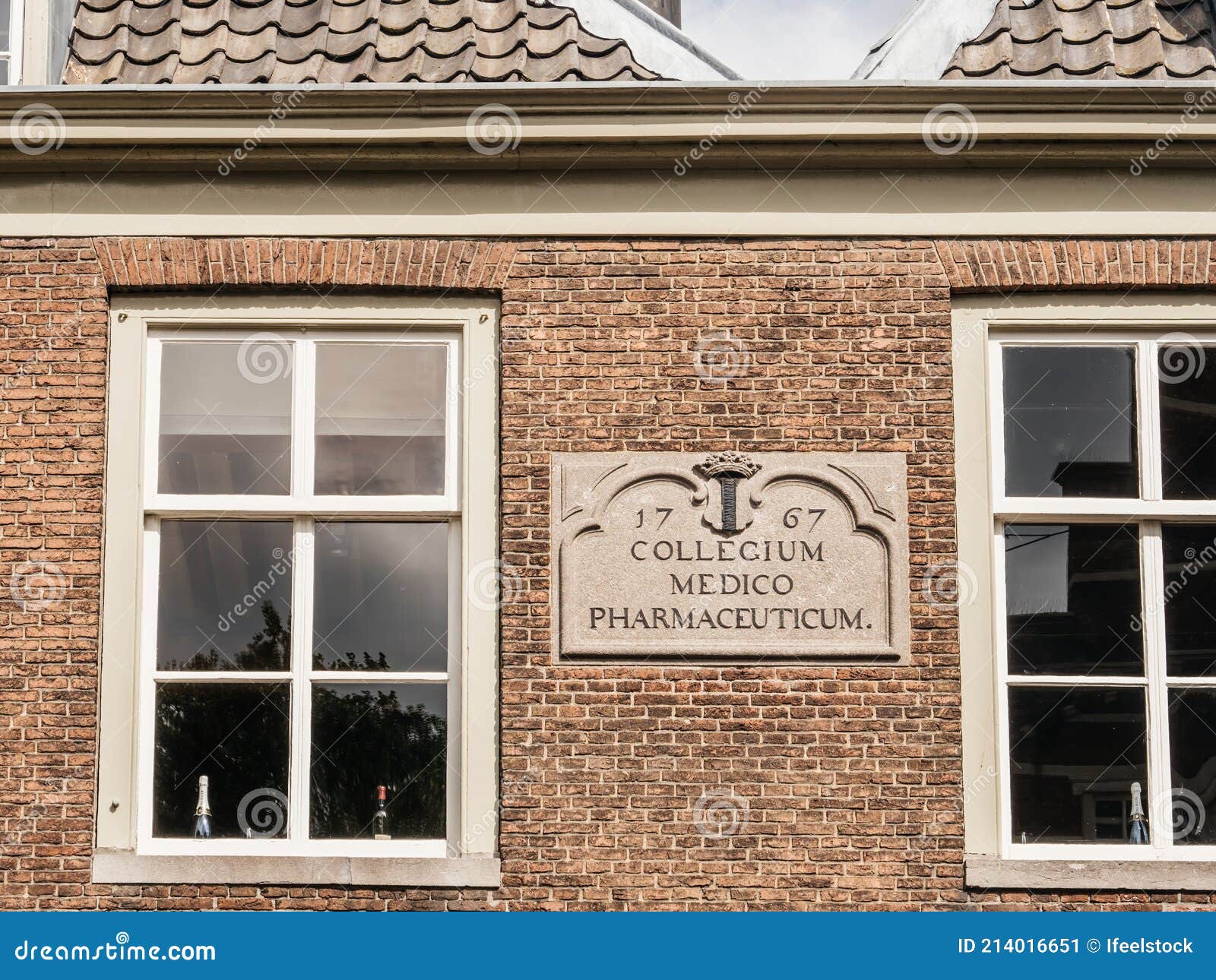 brick facade collegium medico pharmaceutique 1776 in central dutch city