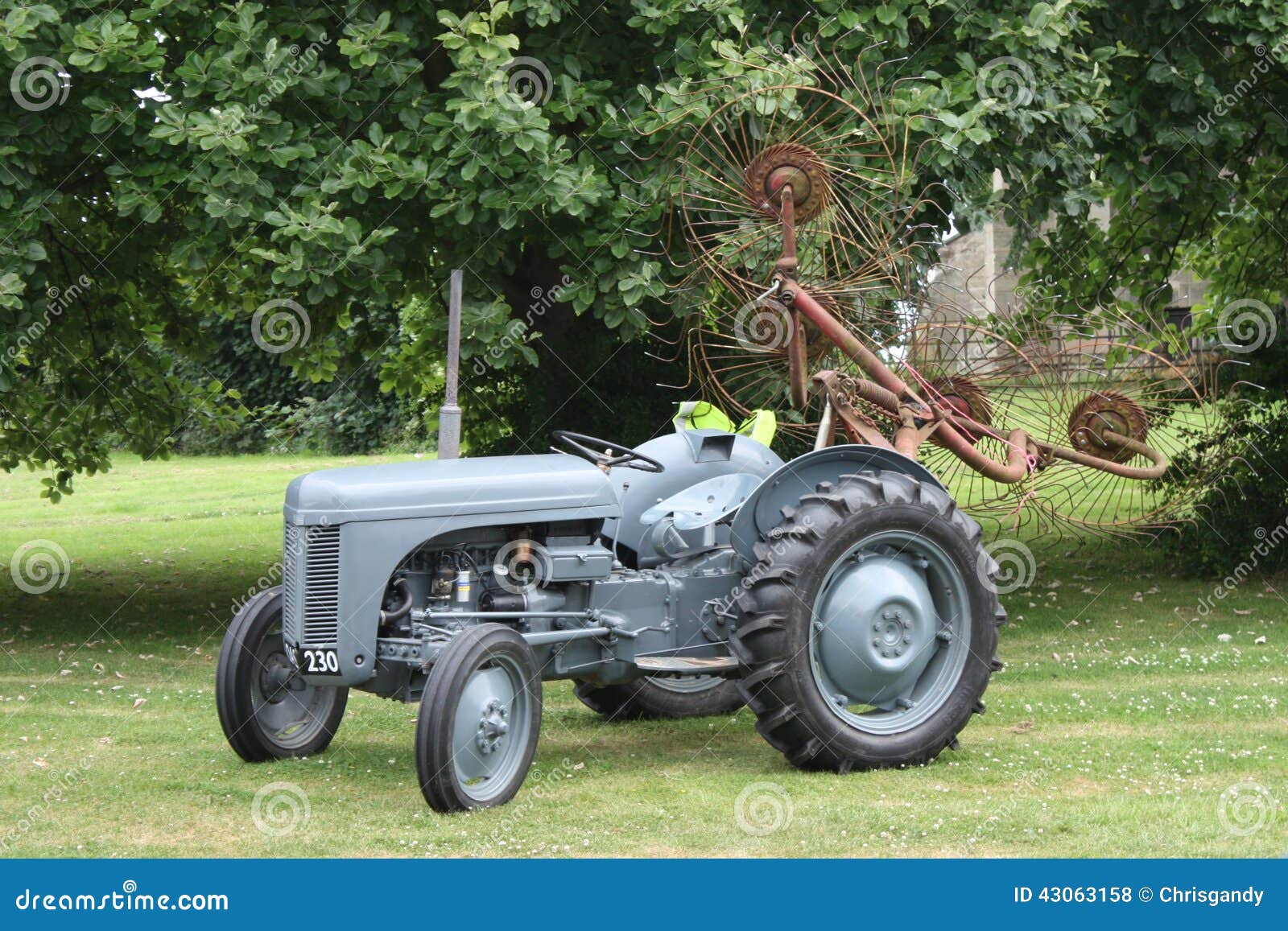 an old vintage little grey fergie ferguson tractor farm equipment