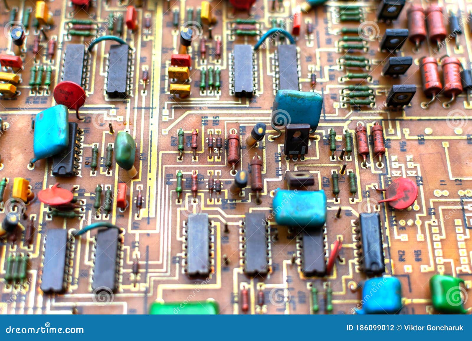 Old Vintage Printed Circuit Board with Electronic Components Stock