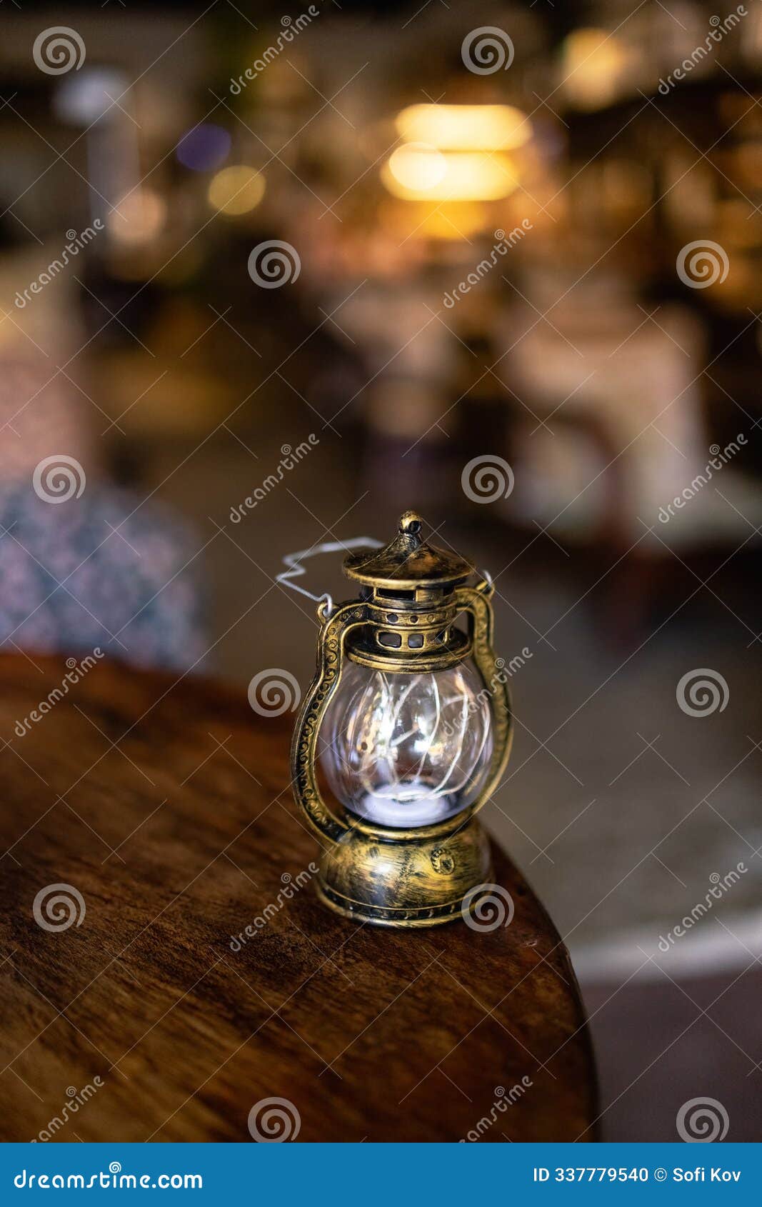 old vintage rusty kerosene black lamp isoleted on gray background. glass oil lamp.