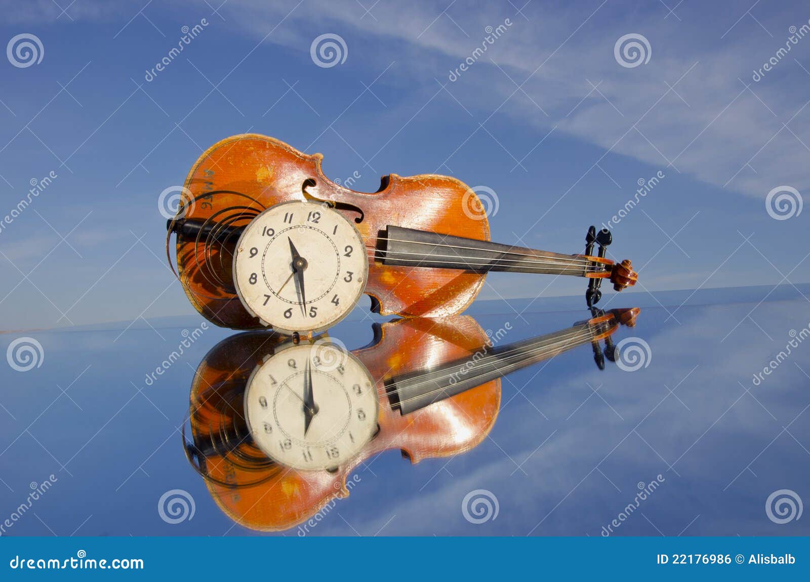Old violin and clockface stock photo. Image of instrument 22176986