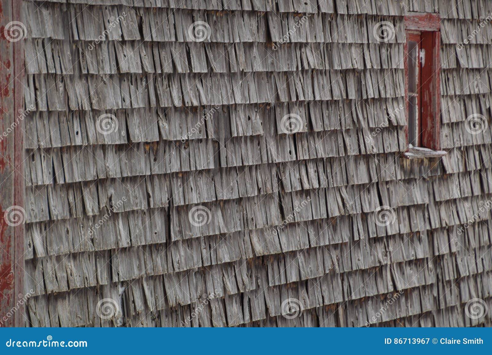 Old Weathered Cedar Shakes Shingles Barn With Red Window Stock Image