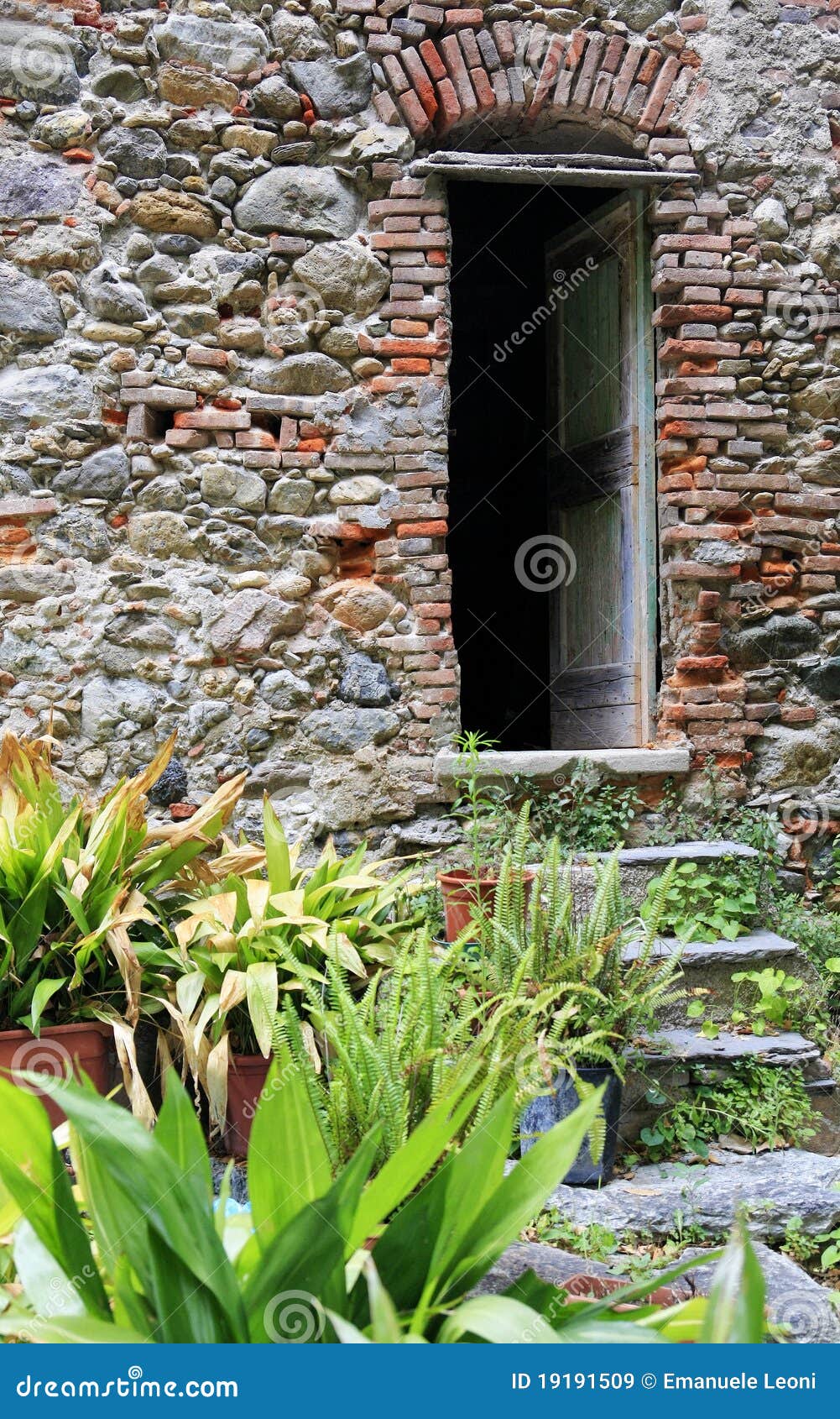 an old weathered doorway in toirano