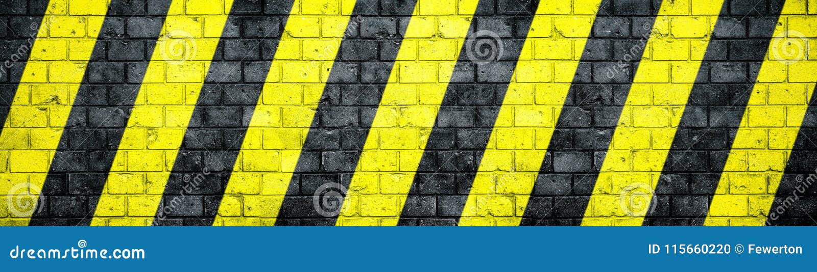 old and weathered grungy brick wall with danger or attention black and yellow warning diagonal stripes texture background banner