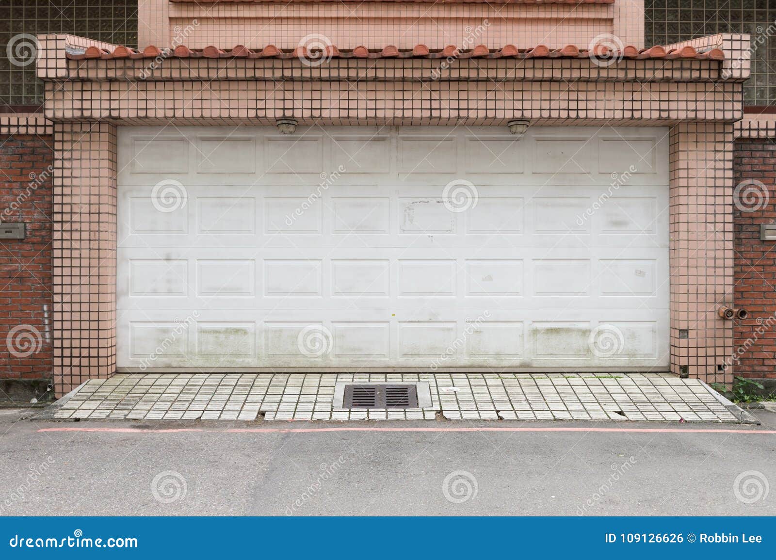 Roll Up Garage Door on Brick Wall Stock Photo Image of entrance