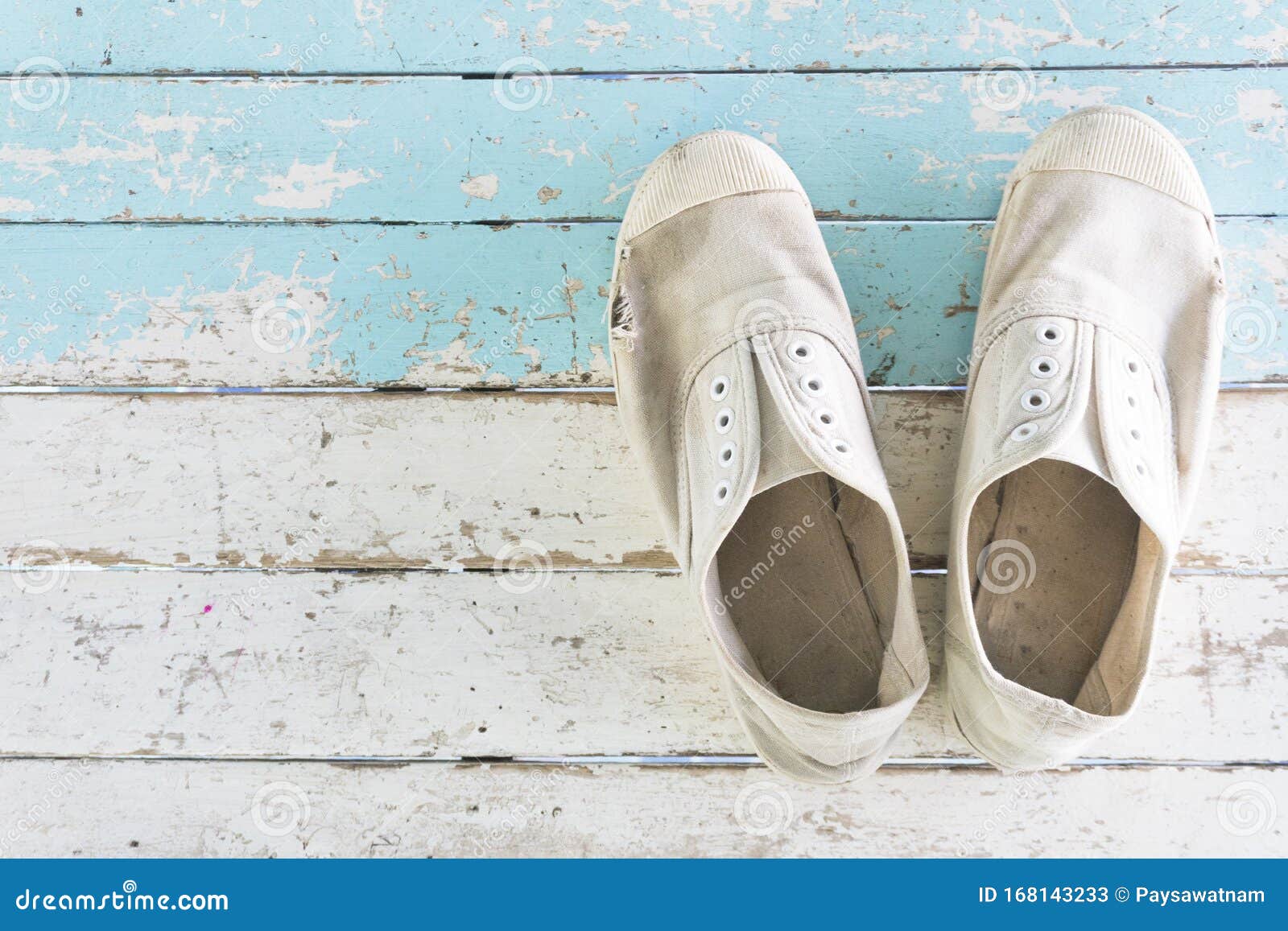Old White Color Sneakers on Old Vintage Wooden. the Shoe on the Left ...
