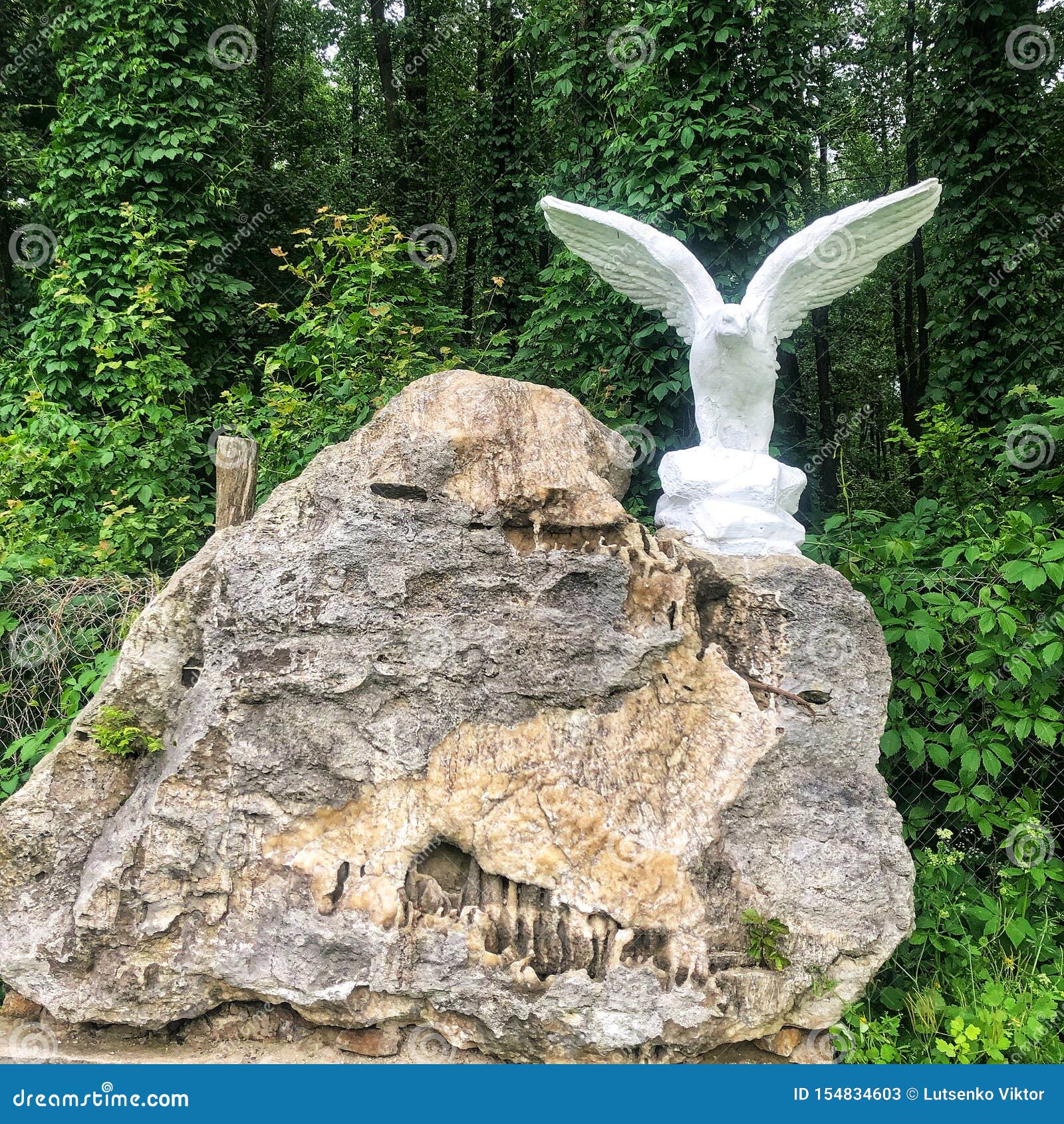 Old White Eagle Statue on Stone in Forest Stock Image Image of
