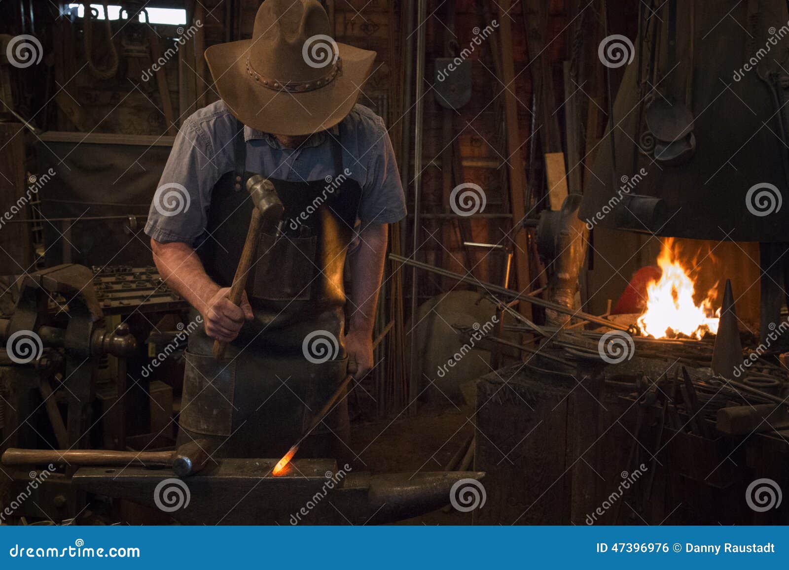 Old Wild West Blacksmith Hammering Stock Photo Image of cowboy