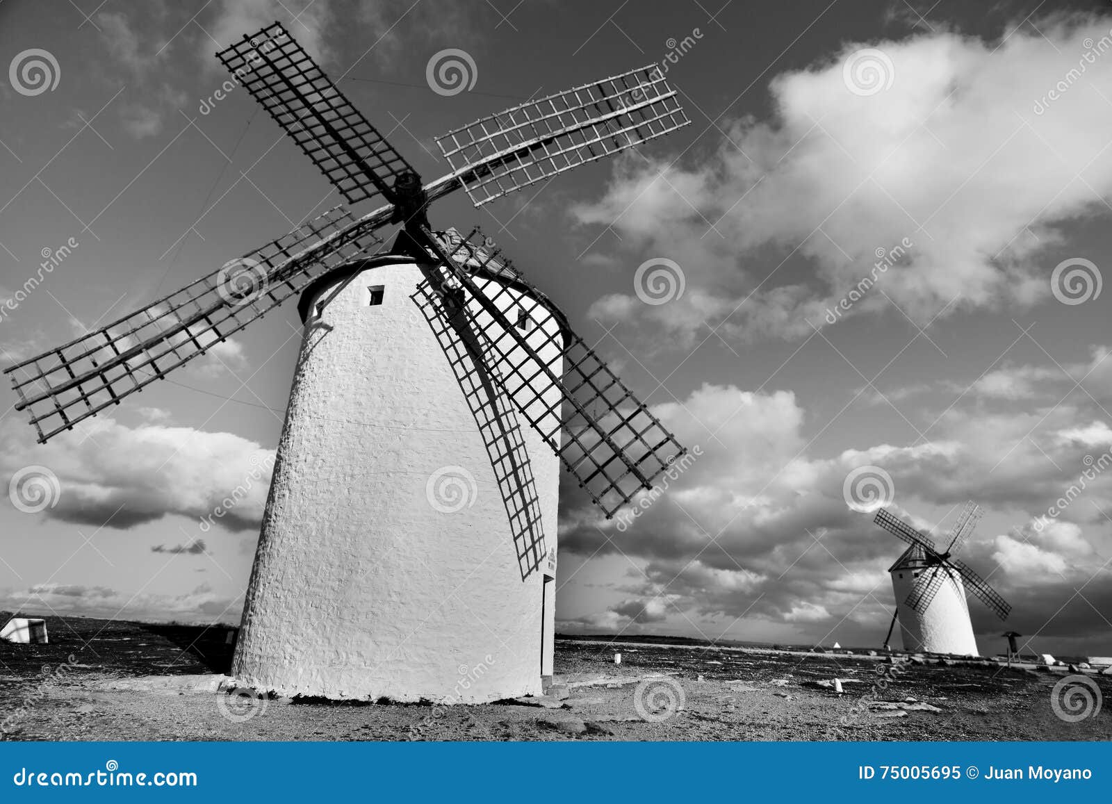 old windmills in campo de criptana, spain, black and white