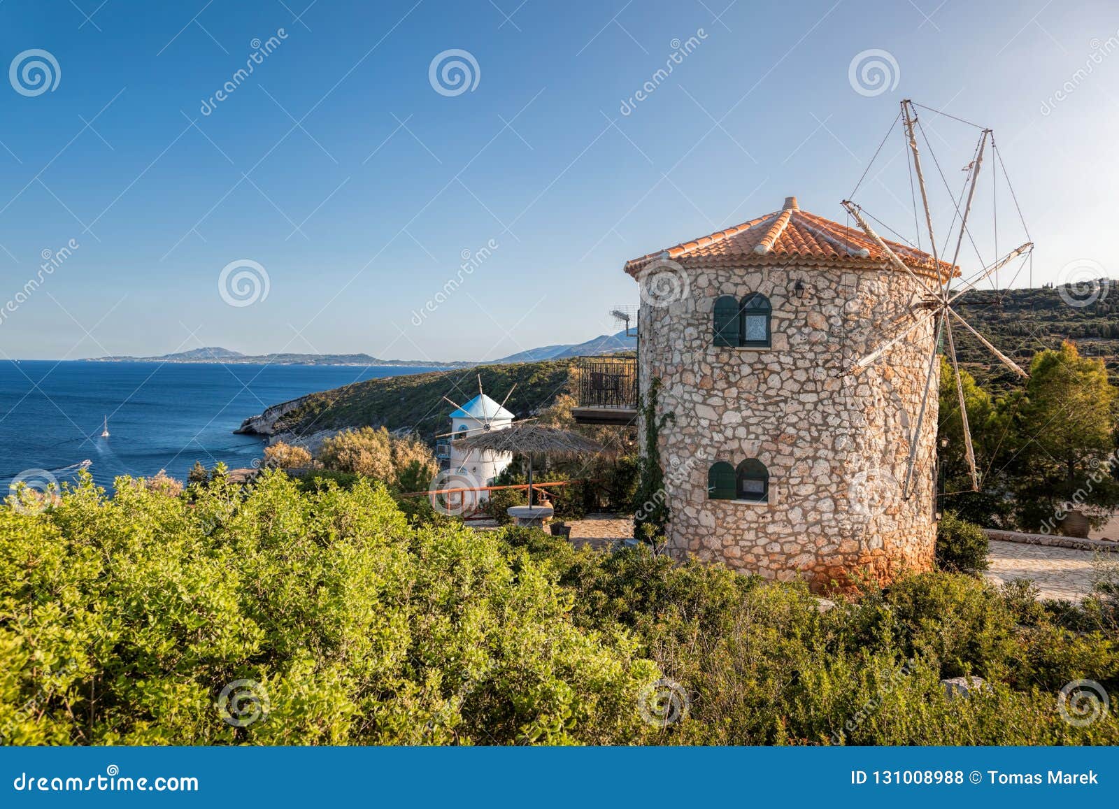 old windmills on skinari, zakynthos island, greece