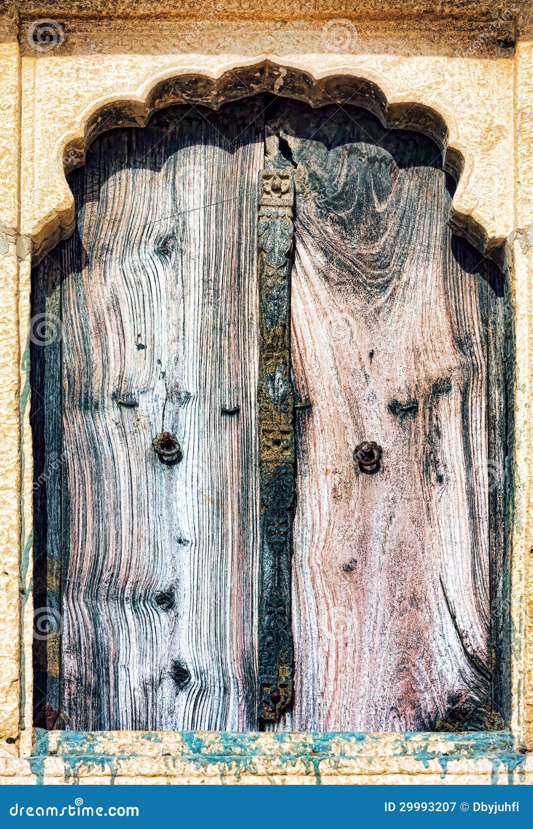 Old Window And Wooden Shutters With Stone-carved 