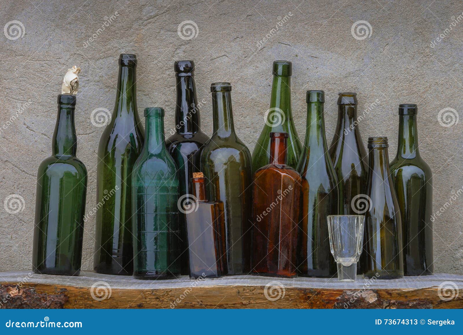 Old wine bottles and glass stock image. Image of wooden 73674313
