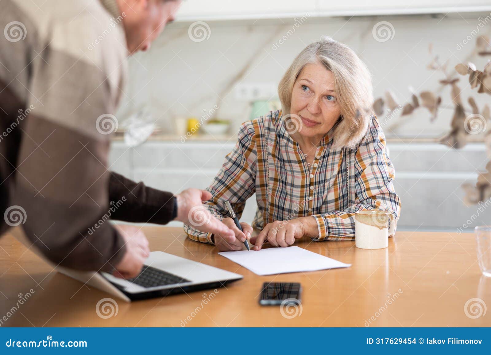 old woman considering offer from agent