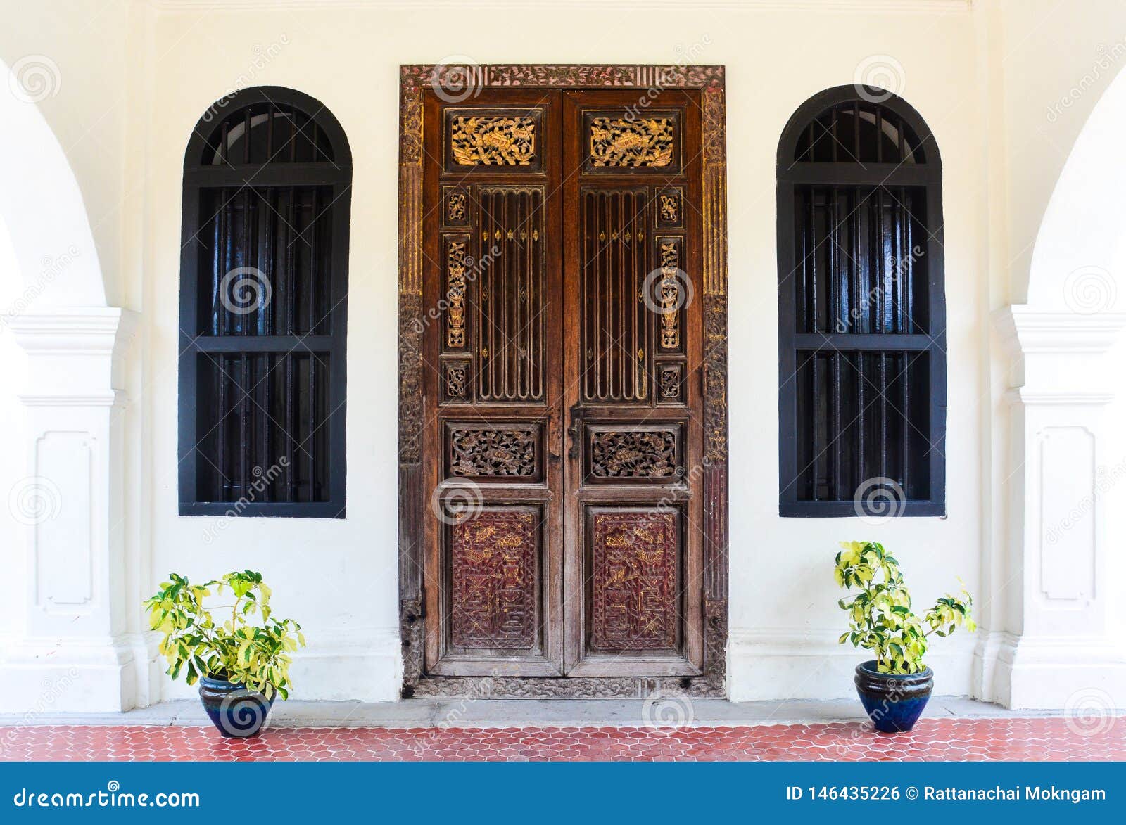 old wood door with chino-portuguese style, phuket, thailand