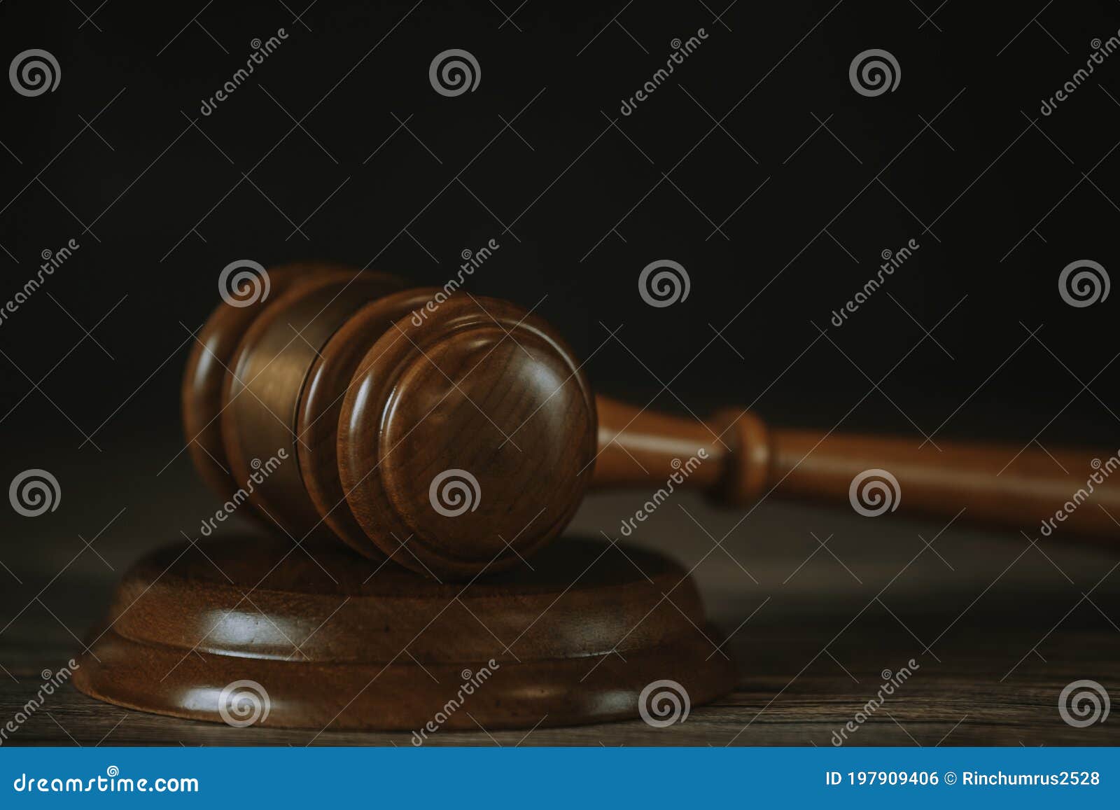 old wood judge hammer with law book on the table wood background, used for adjudication and justice