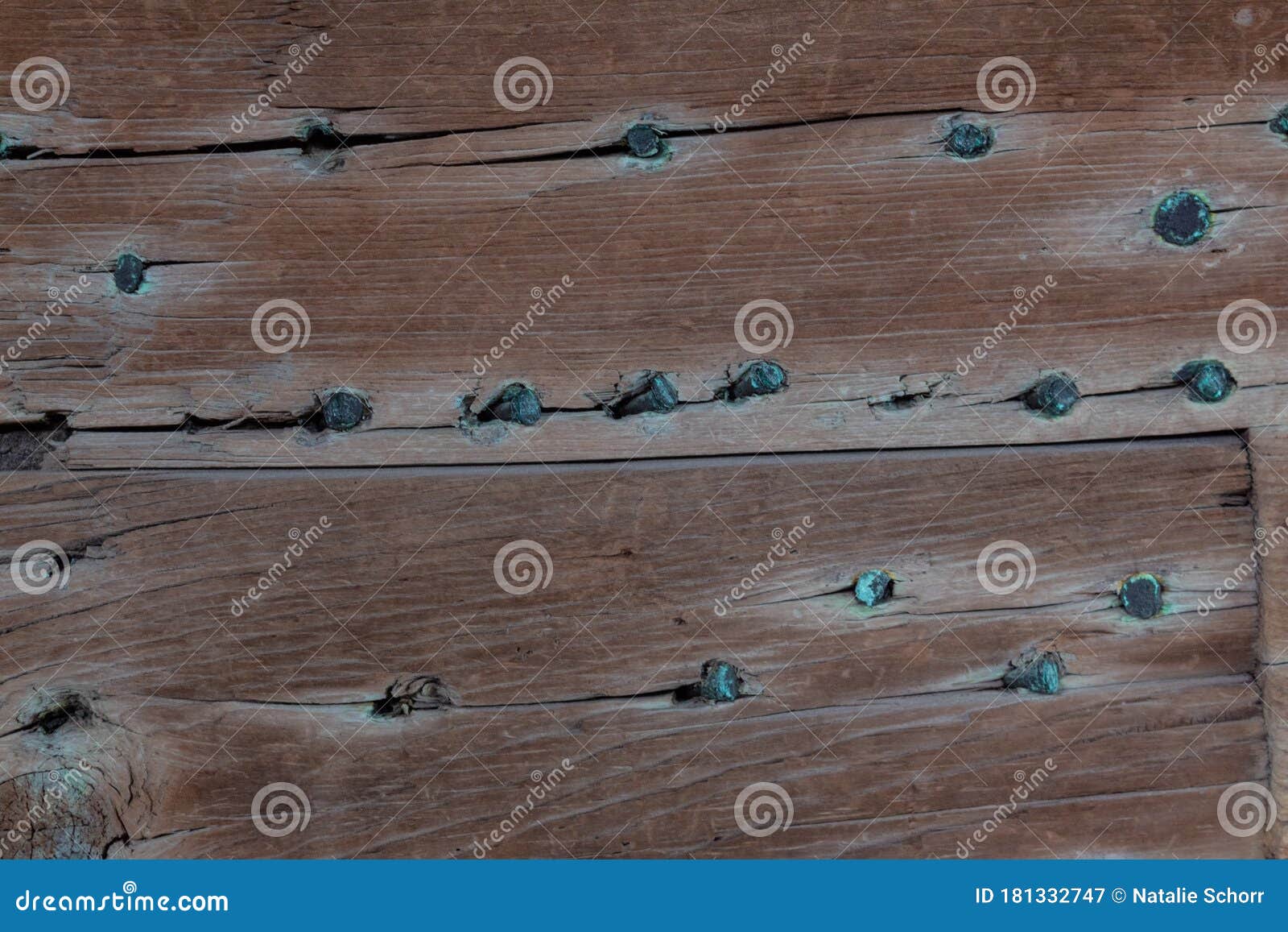 old wood planks nailed with hand made nails, verdigris patina, creative copy space background craftsmanship