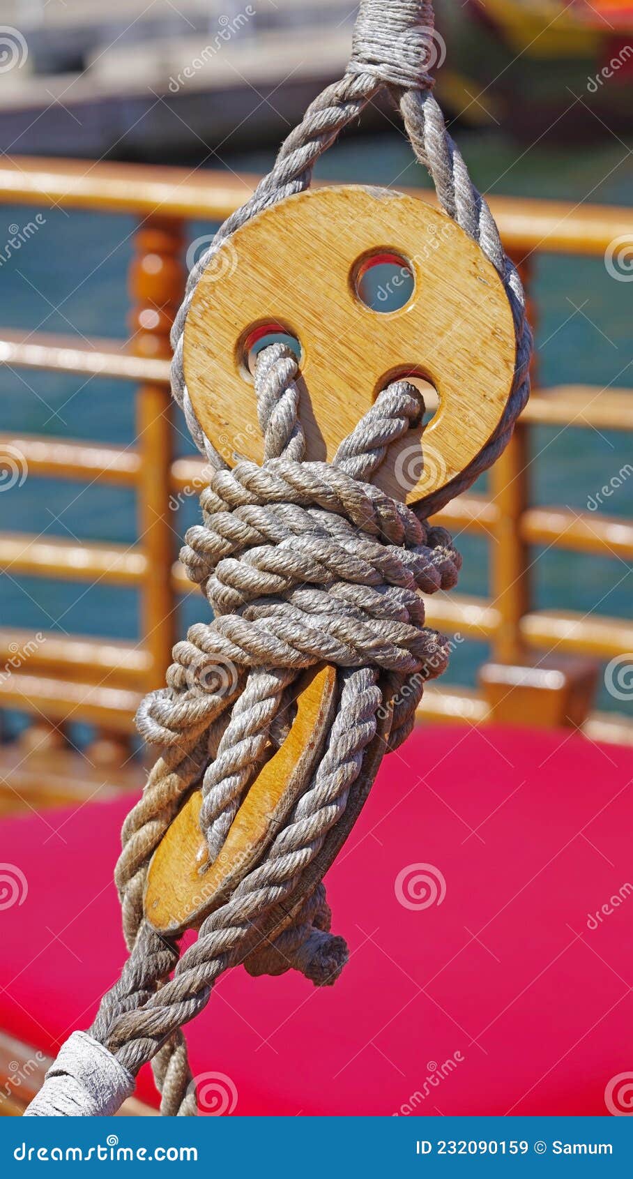 Old wooden block with rope stock image. Image of gray 232090159
