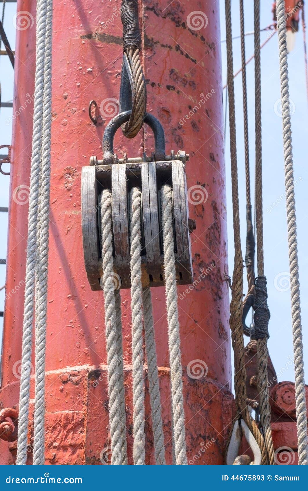 Old wooden block with rope stock image. Image of gray 44675893