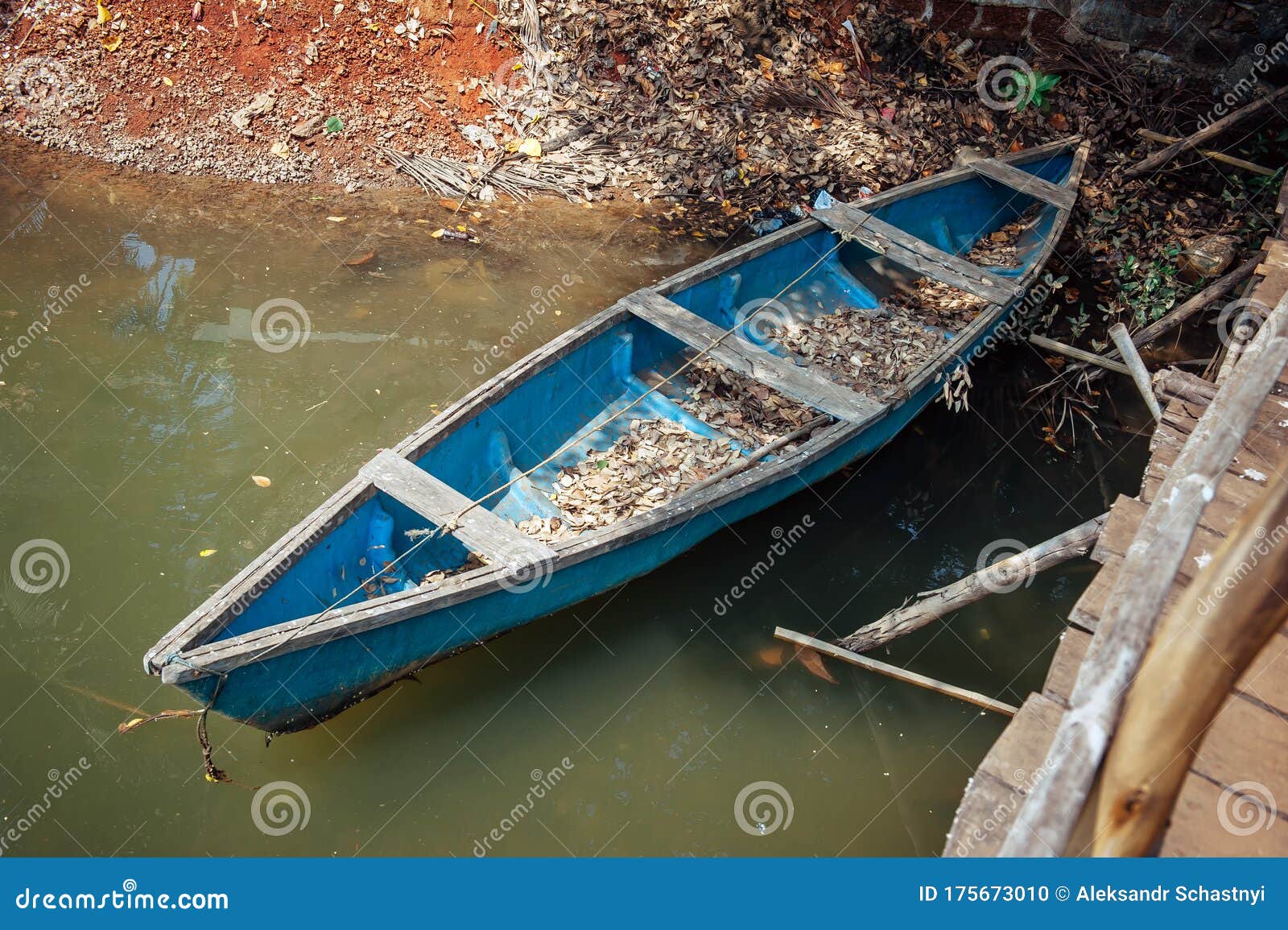 Old Wooden Boat in the Water, Top View. Small Blue Fishing Boat on the Bank  of Asian River, Close Up Stock Photo - Image of closeup, dirty: 175673010