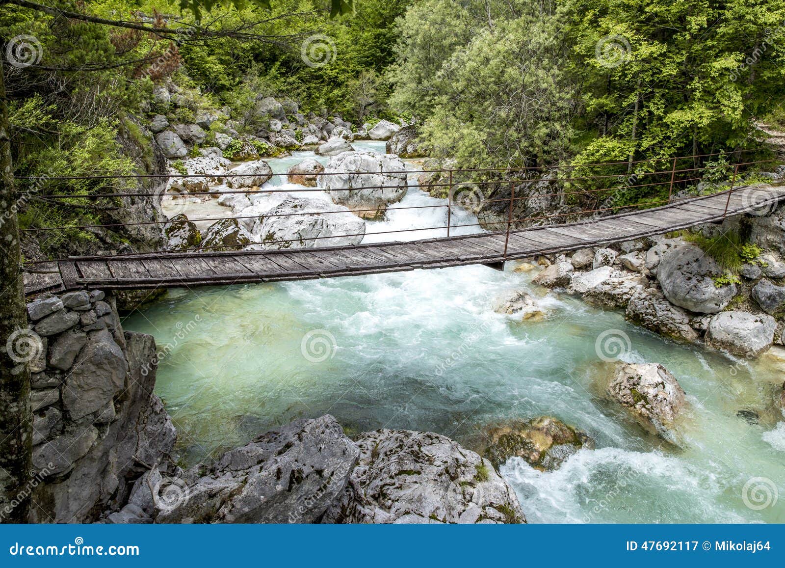 old wooden bridge over soca river