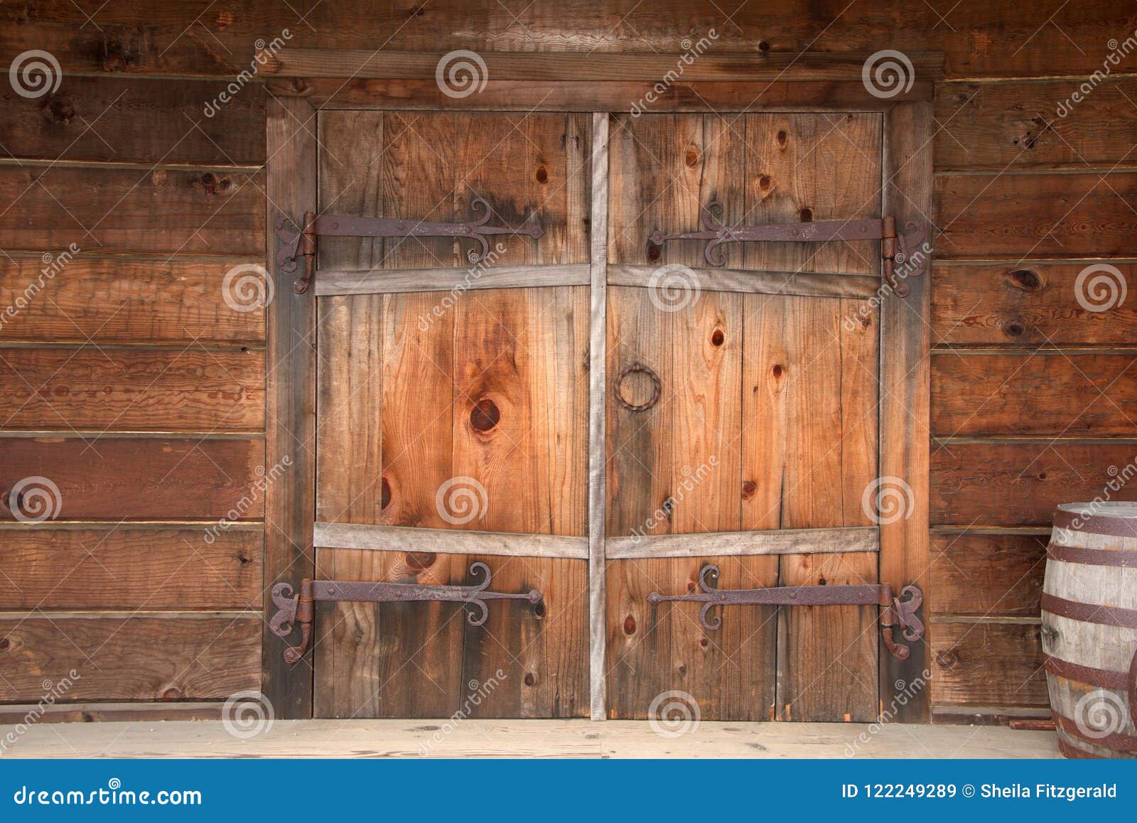 Old Wooden Double Doors With Rusty Weathered Hardware 