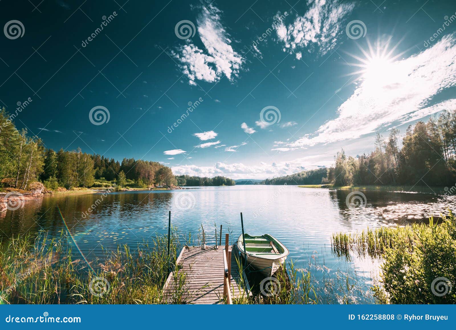 Old Wooden Fishing Boat Moored Near Pier in Summer Lake or River ...