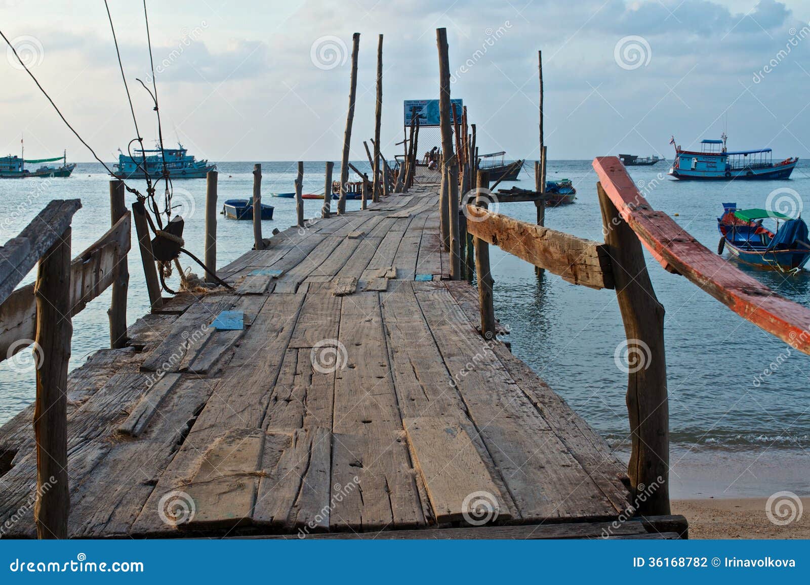 Old Wooden Pier And Boats In The Sea Stock Photography ...