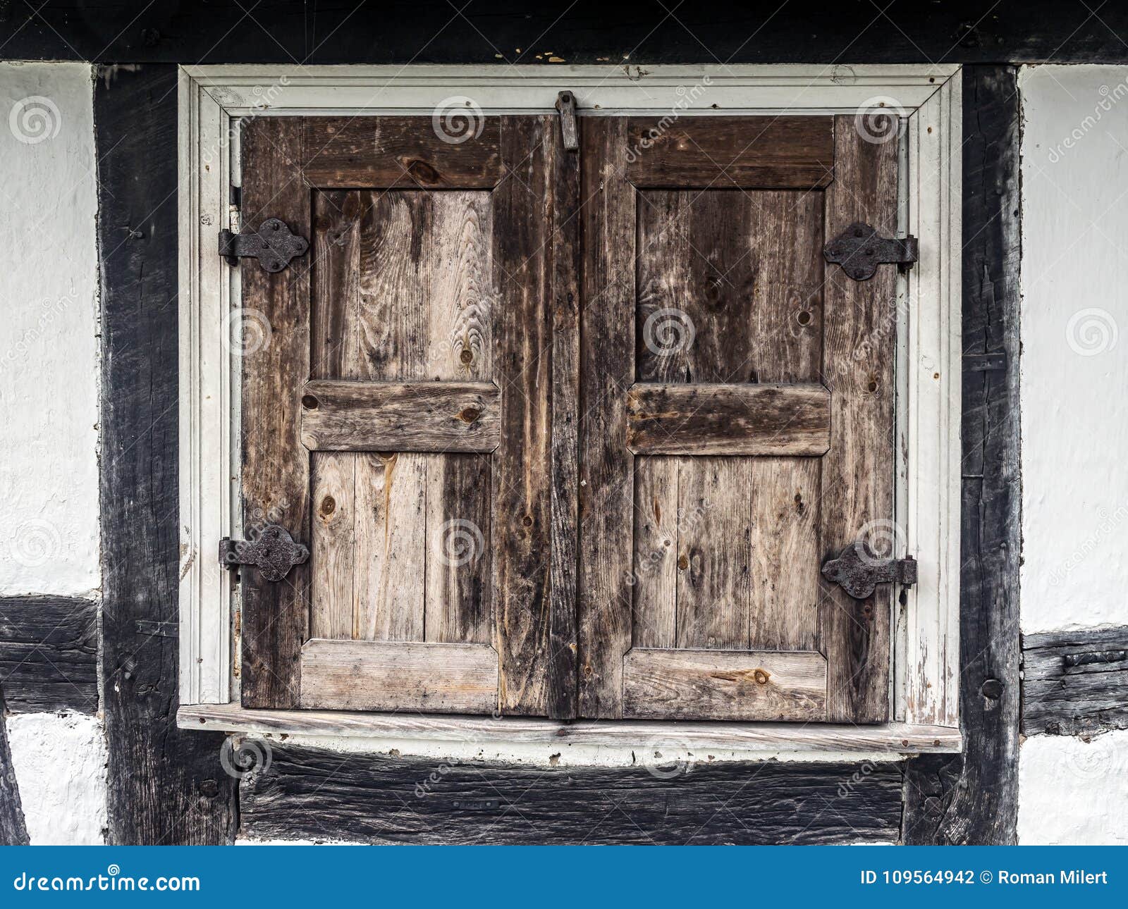 Rustic window shutters stock photo. Image of wooden 109564942