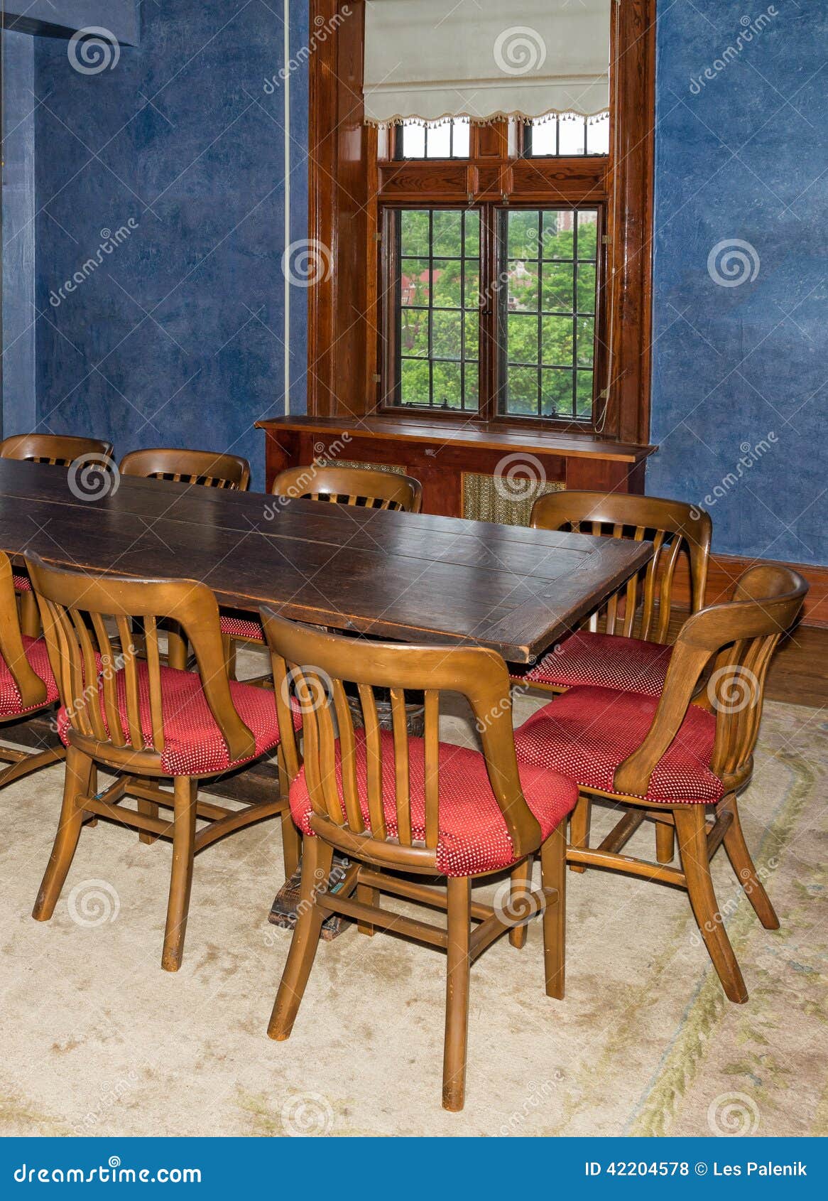 old wooden dining table and chairs