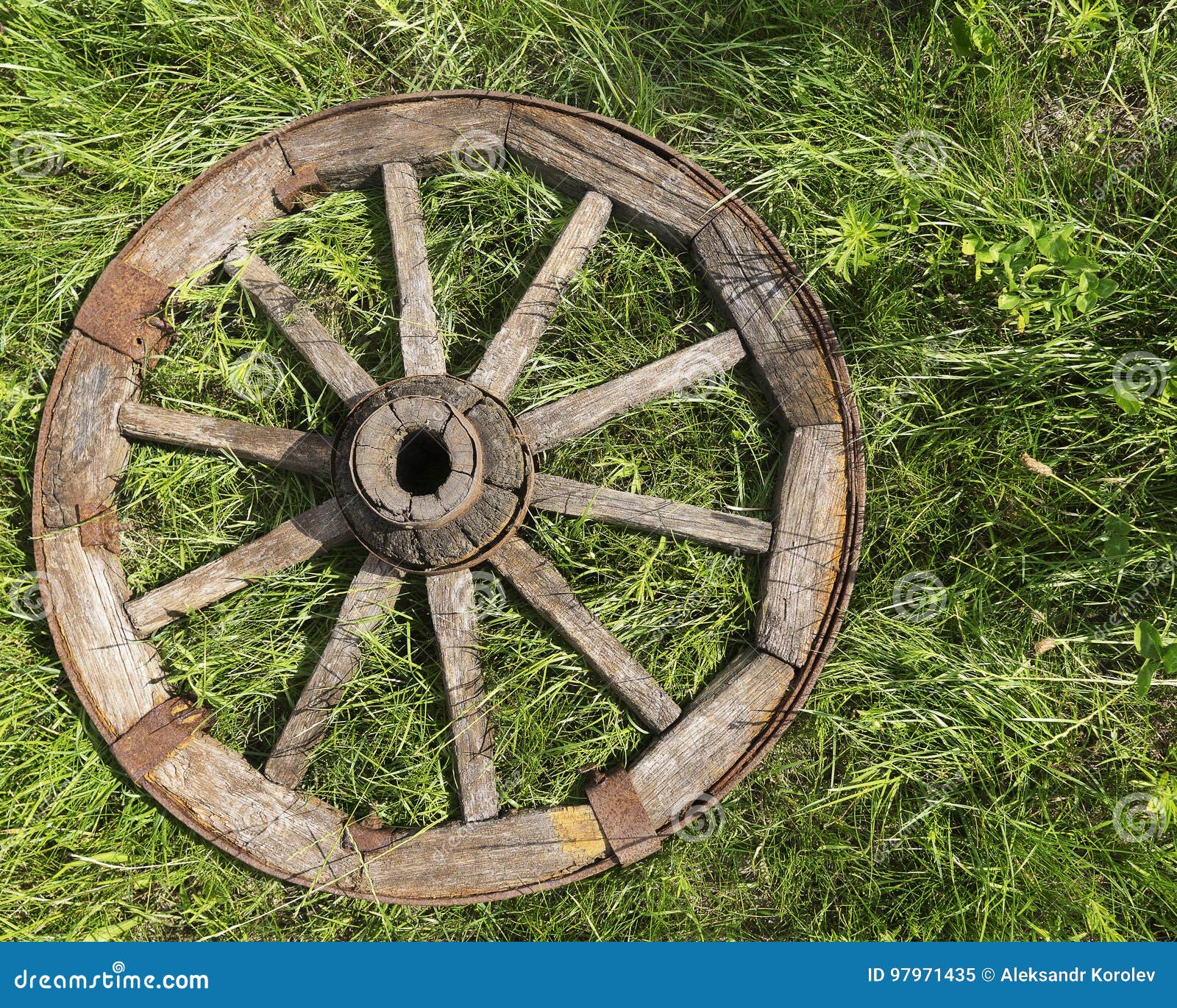 Old wooden wheel stock image. Image of farm, brown, lawn 97971435