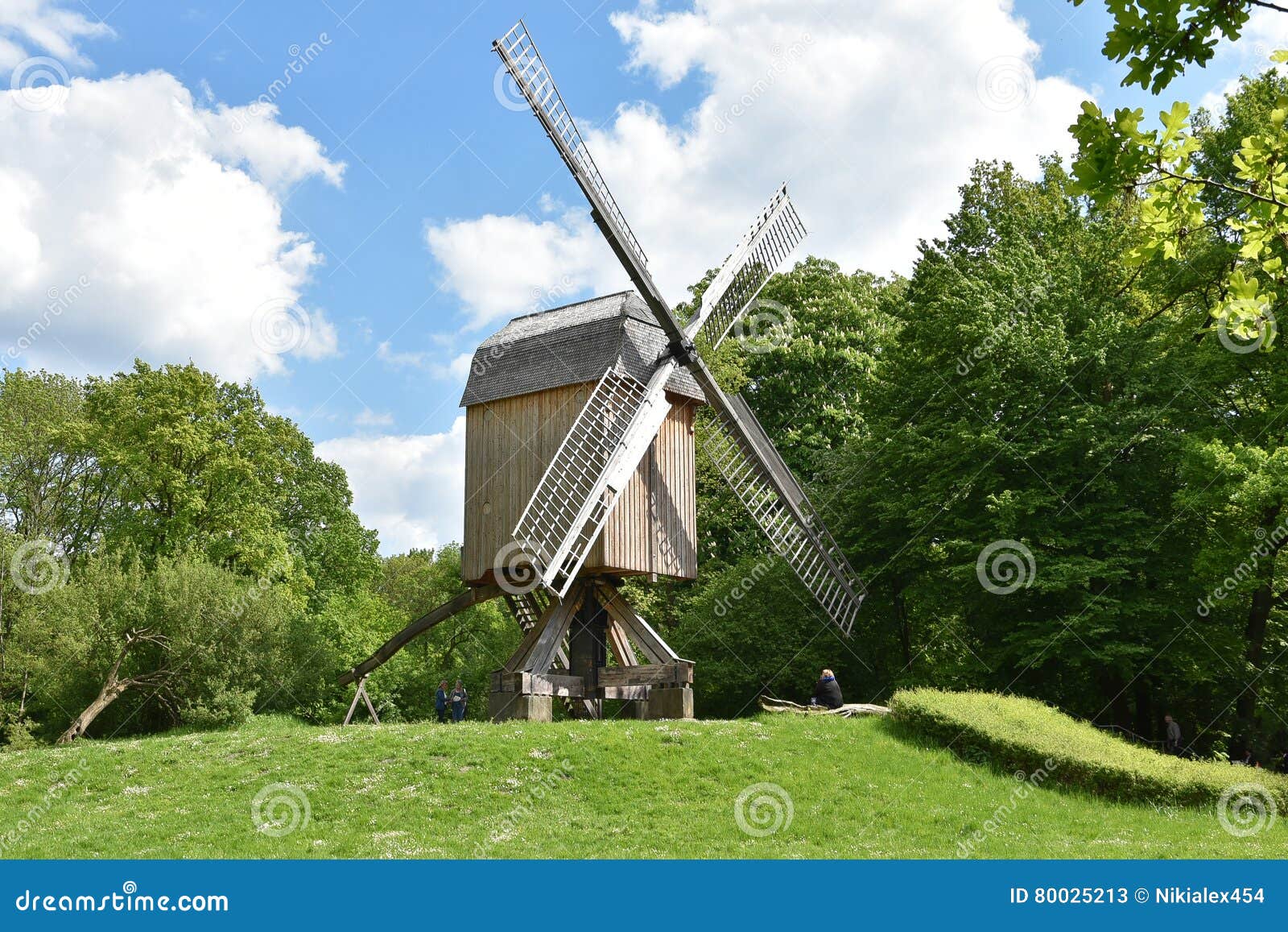 Old Wooden Windmill on a Background of Trees Stock Image - Image of
