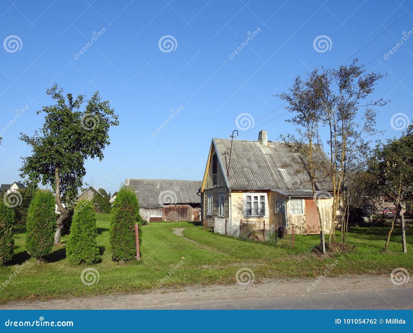 old yellow wooden home, lithuania