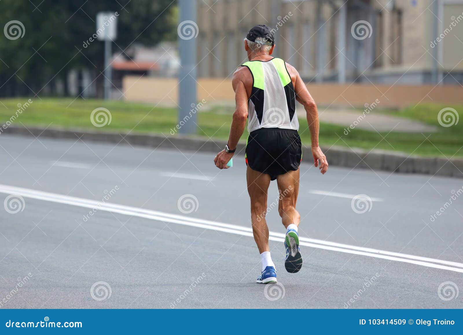 Older Athlete Runs a Marathon Editorial Stock Image Image of person