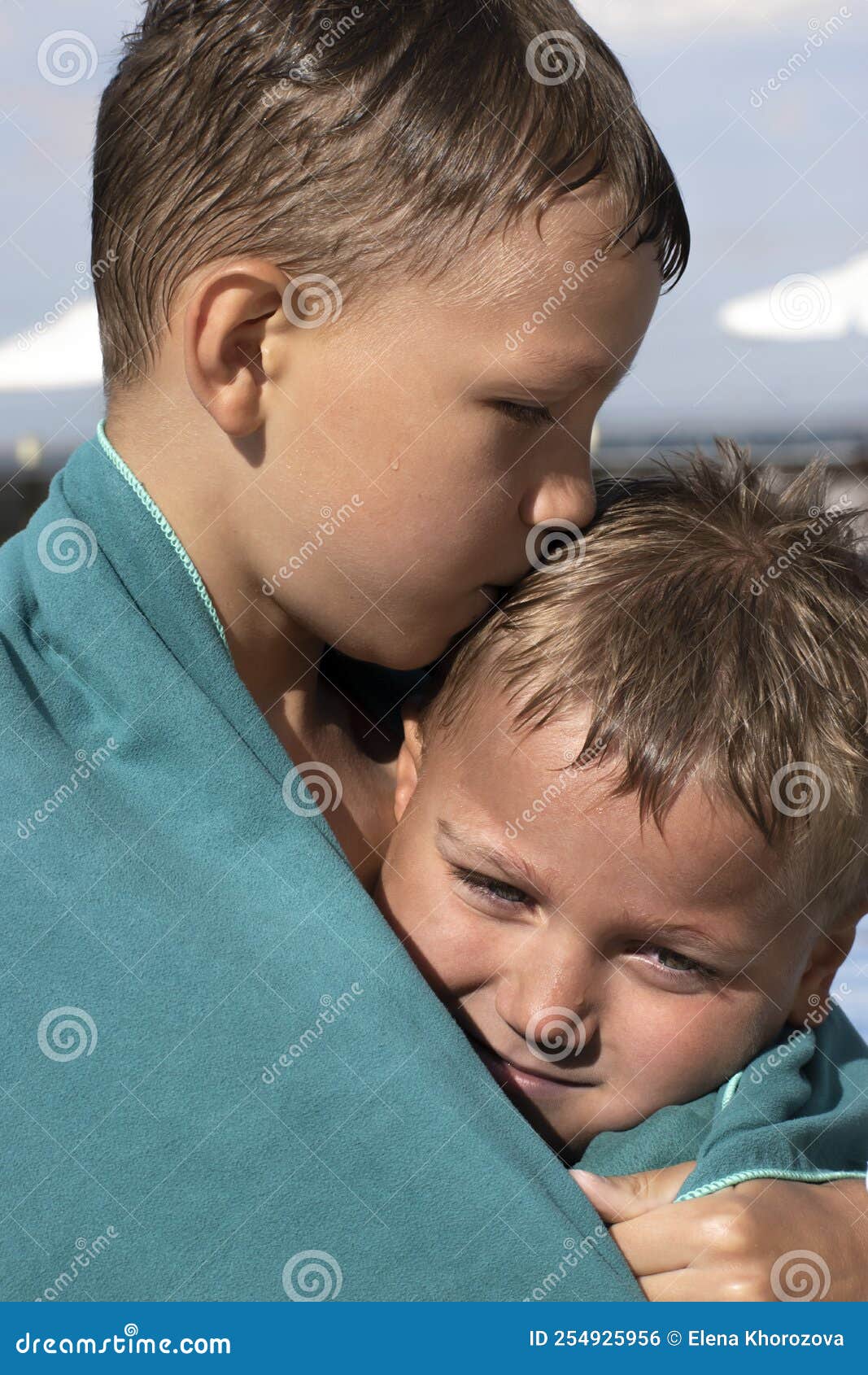 Older Brother Hug and Kiss Younger One Showing Love, Care and Emotional