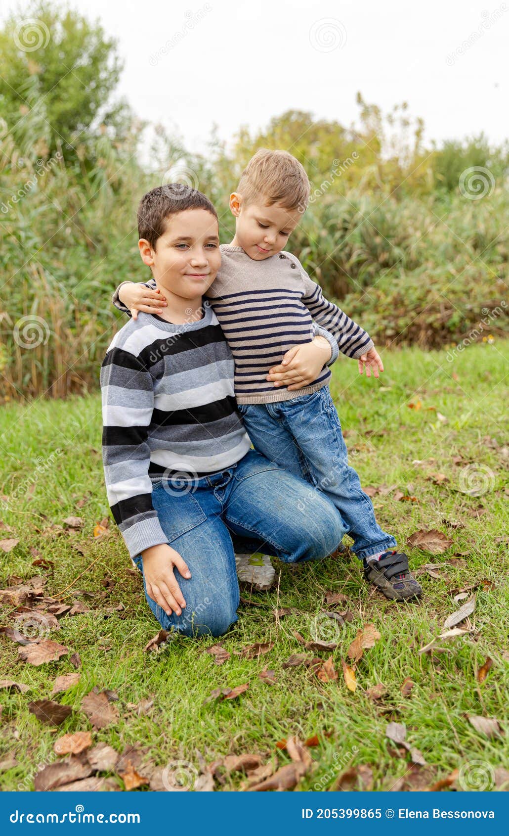 Older Brother Hugging His Younger Brother. Happy Family. Brother ...